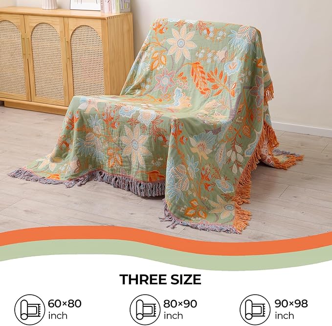 CozyNest Decor boho fall throw blanket with floral print in orange and sage green, soft breathable ultra cotton for bed or sofa.