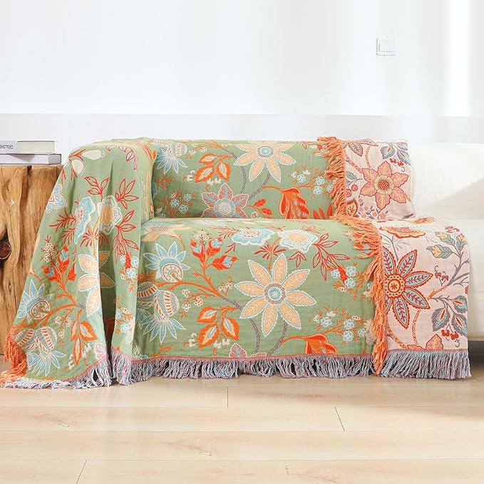 CozyNest Decor boho fall throw blanket with floral print in orange and sage green, soft breathable 100% cotton for bed or sofa.