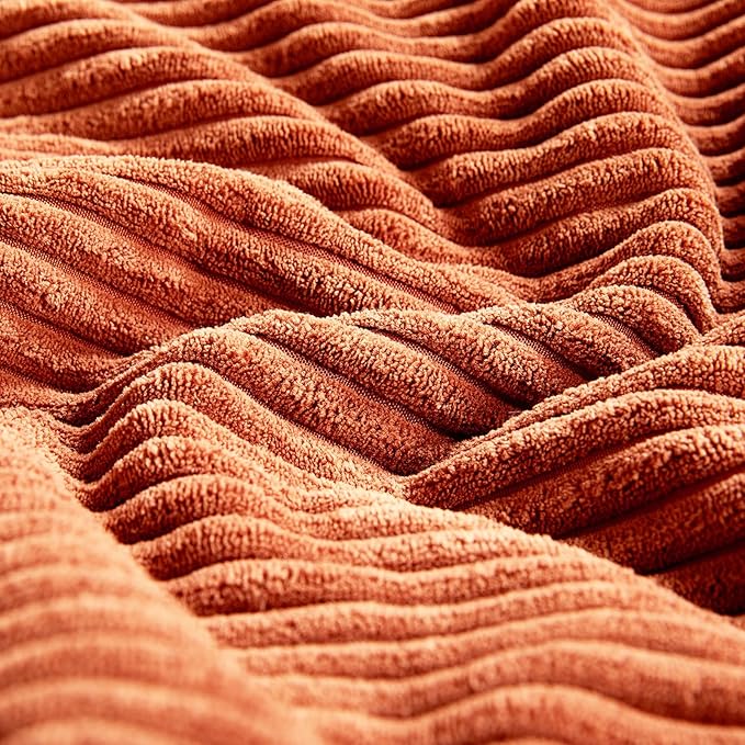 Set of 2 burnt orange lumbar throw pillow covers with textured corduroy fabric, ideal for living room or bedroom decor.
