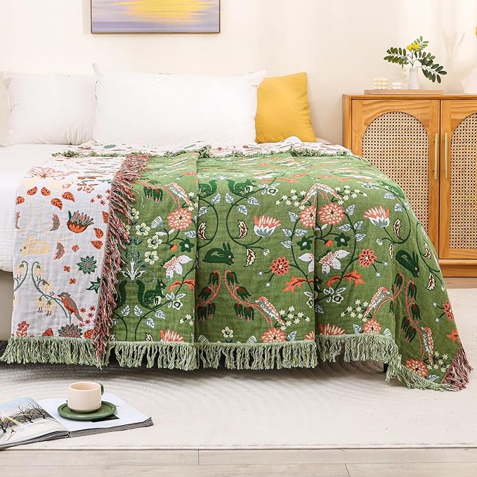 CozyNest Decor boho cotton throw blanket with floral and animal prints, large rustic quilt for king bed, sofa, or chair, all-season comfort.