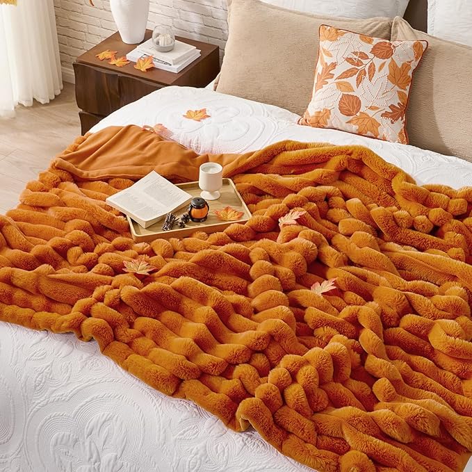 CozyNest Decor fall harvest faux fur throw blanket in burnt orange, plush striped design for couch, sofa, or bedroom decor.