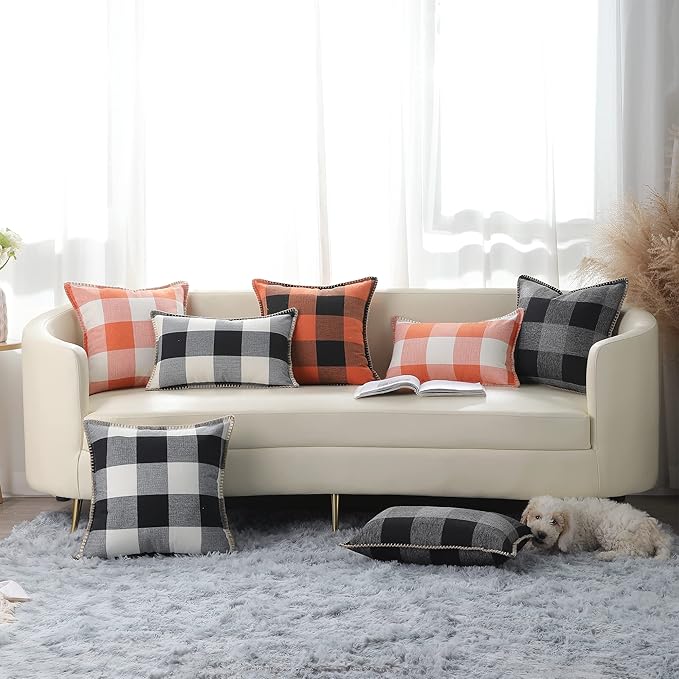 CozyNest Decor fall orange and black buffalo plaid throw pillow covers, 18x18 inches, with stitched edges for autumn farmhouse decor.