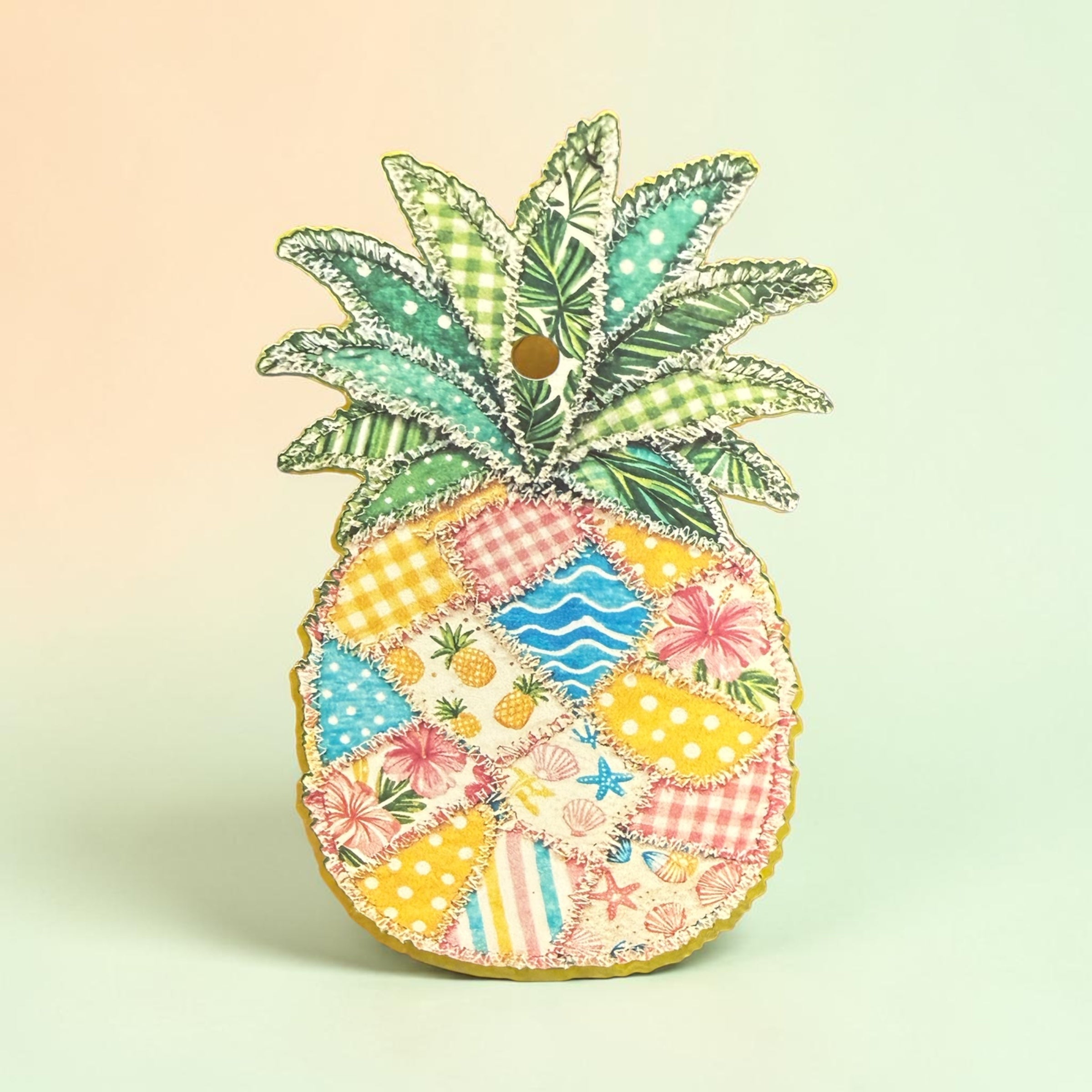 Pineapple Patchwork Freshie by Bug & Bean Freshies featuring colorful patchwork fabric and pineapple design.