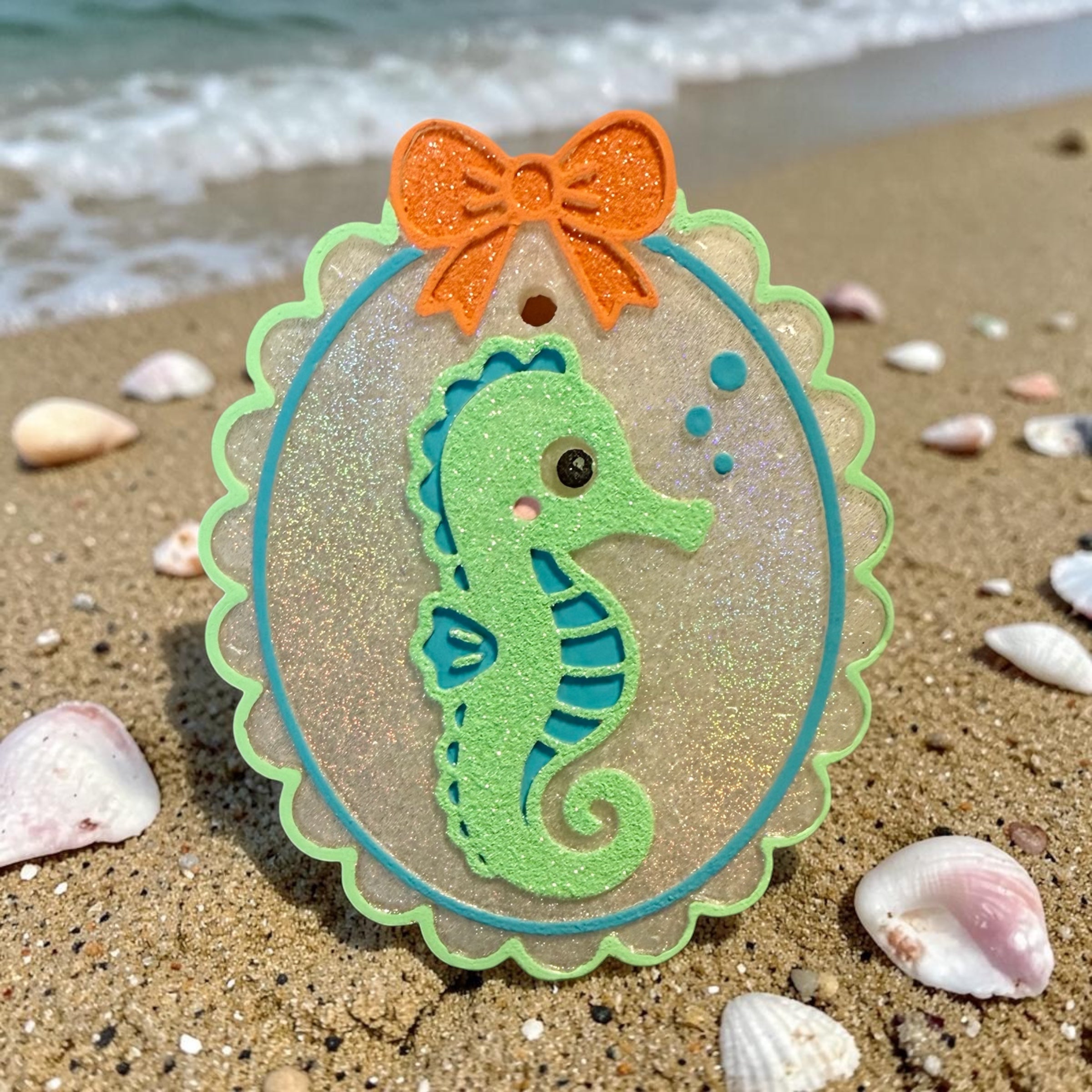 Colorful seahorse-shaped air freshie by Bug & Bean Freshies, designed to add a fresh ocean scent to your space.
