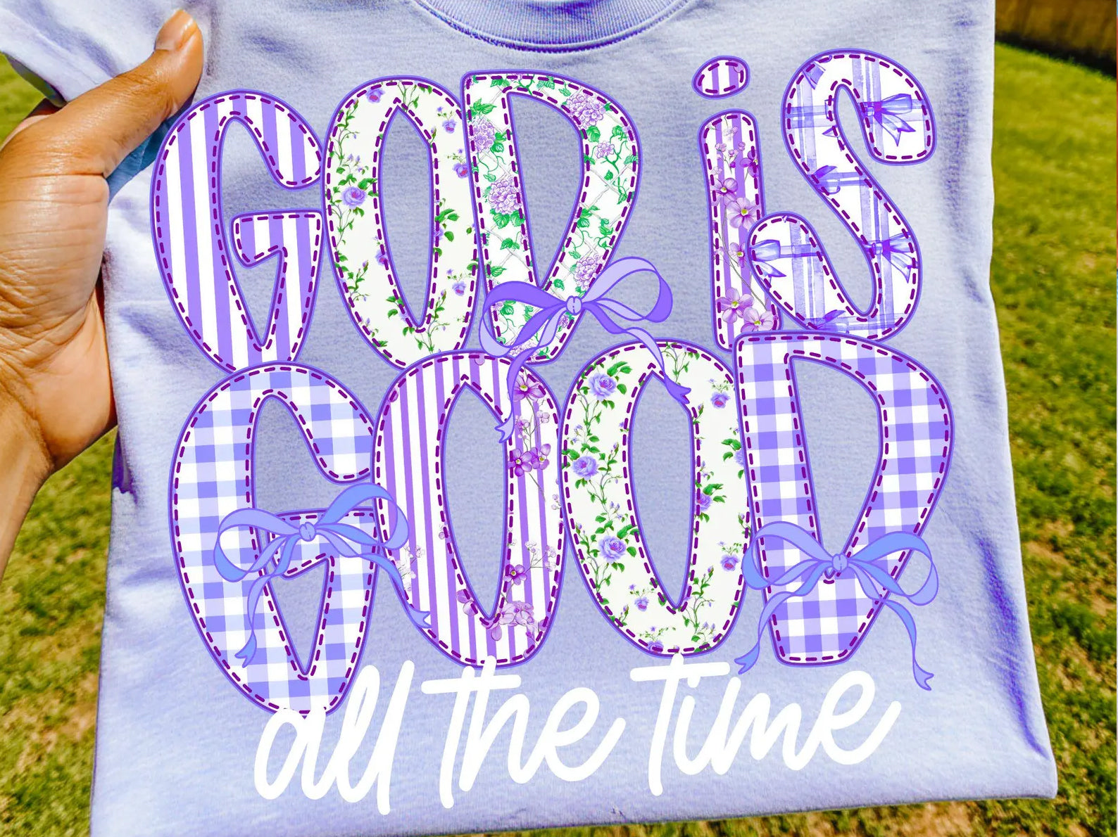 Black God is Good graphic tee by Anchored Grace Boutique featuring bold white text on soft cotton fabric.
