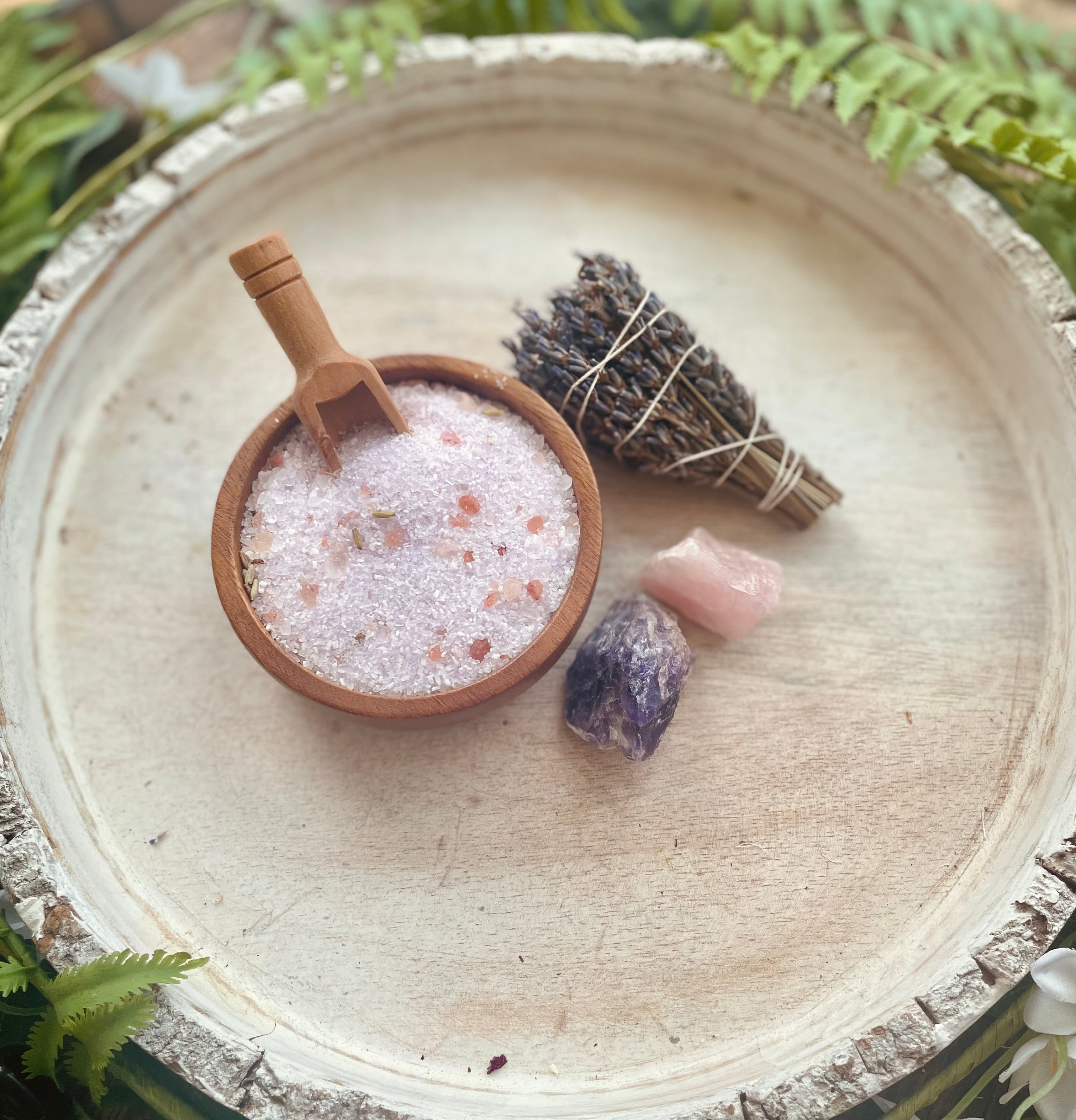 Lavender bath salts in a tube labeled Forget Me Not by Sage & Stone Apothecary, perfect for relaxing body care and wellness.