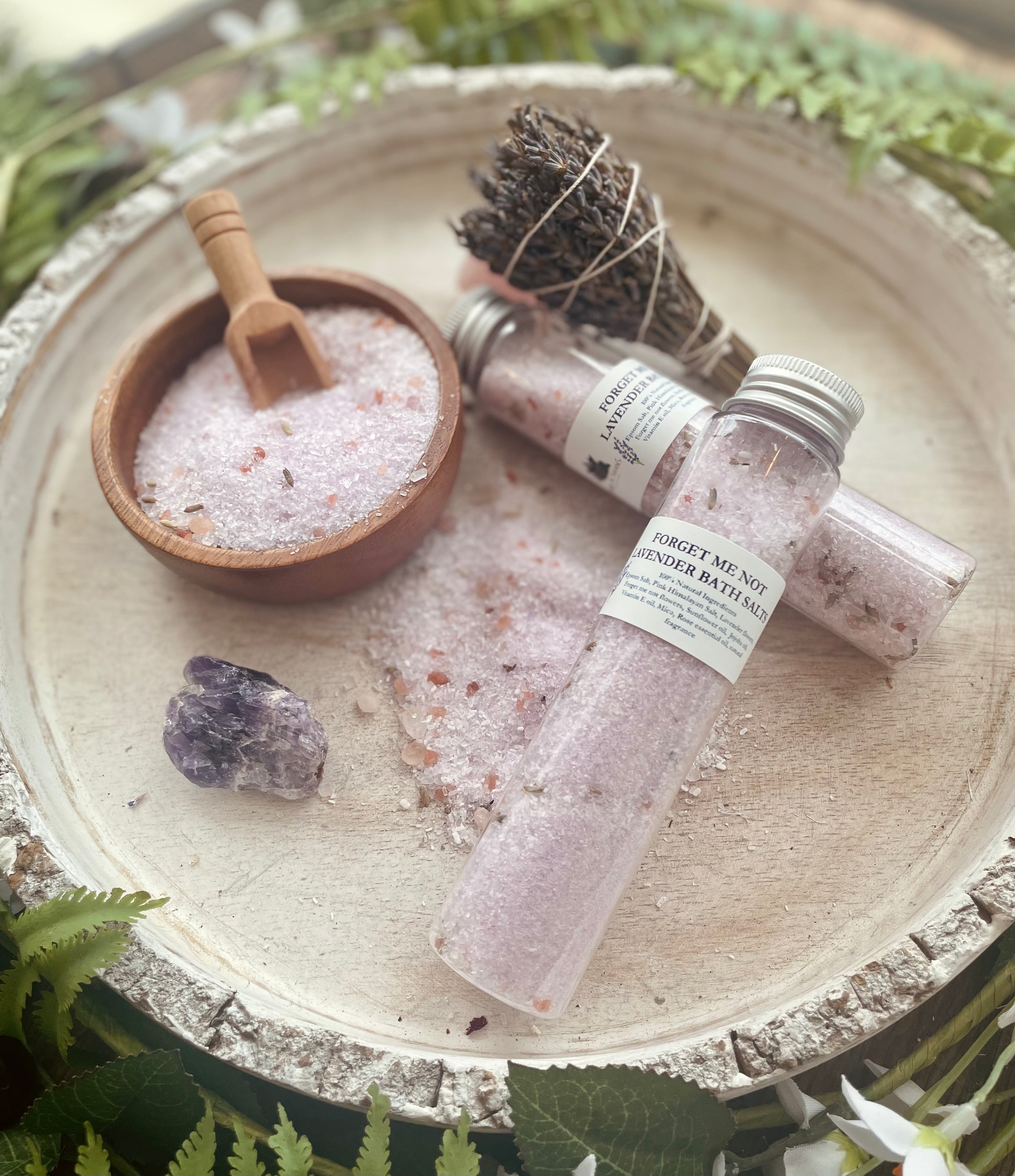 Lavender bath salts in a tube from Sage & Stone Apothecary, designed for relaxing body care and wellness.