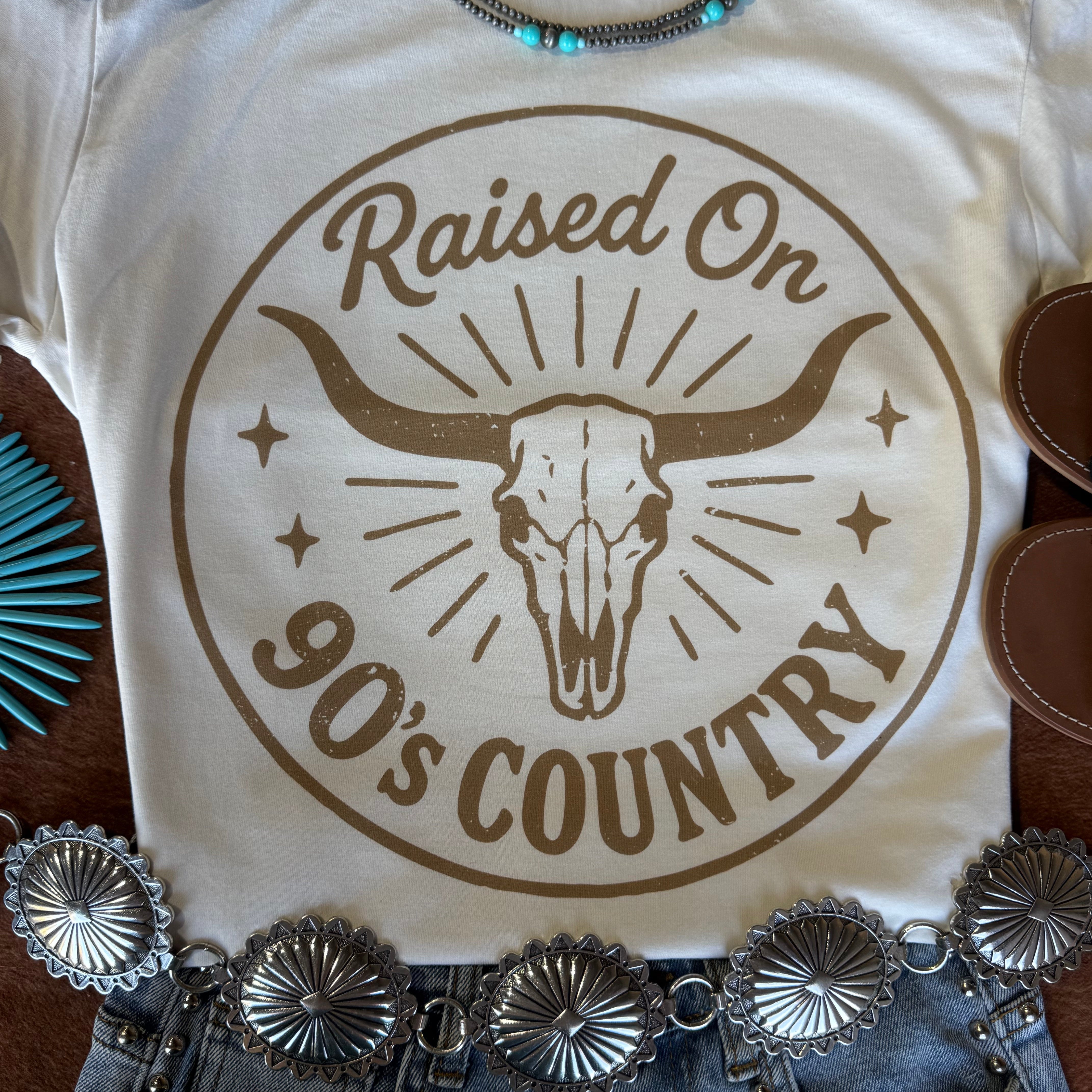 Wild Junkie raised on 90's country steer skull graphic tee, casual men's t-shirt with bold country-themed print.
