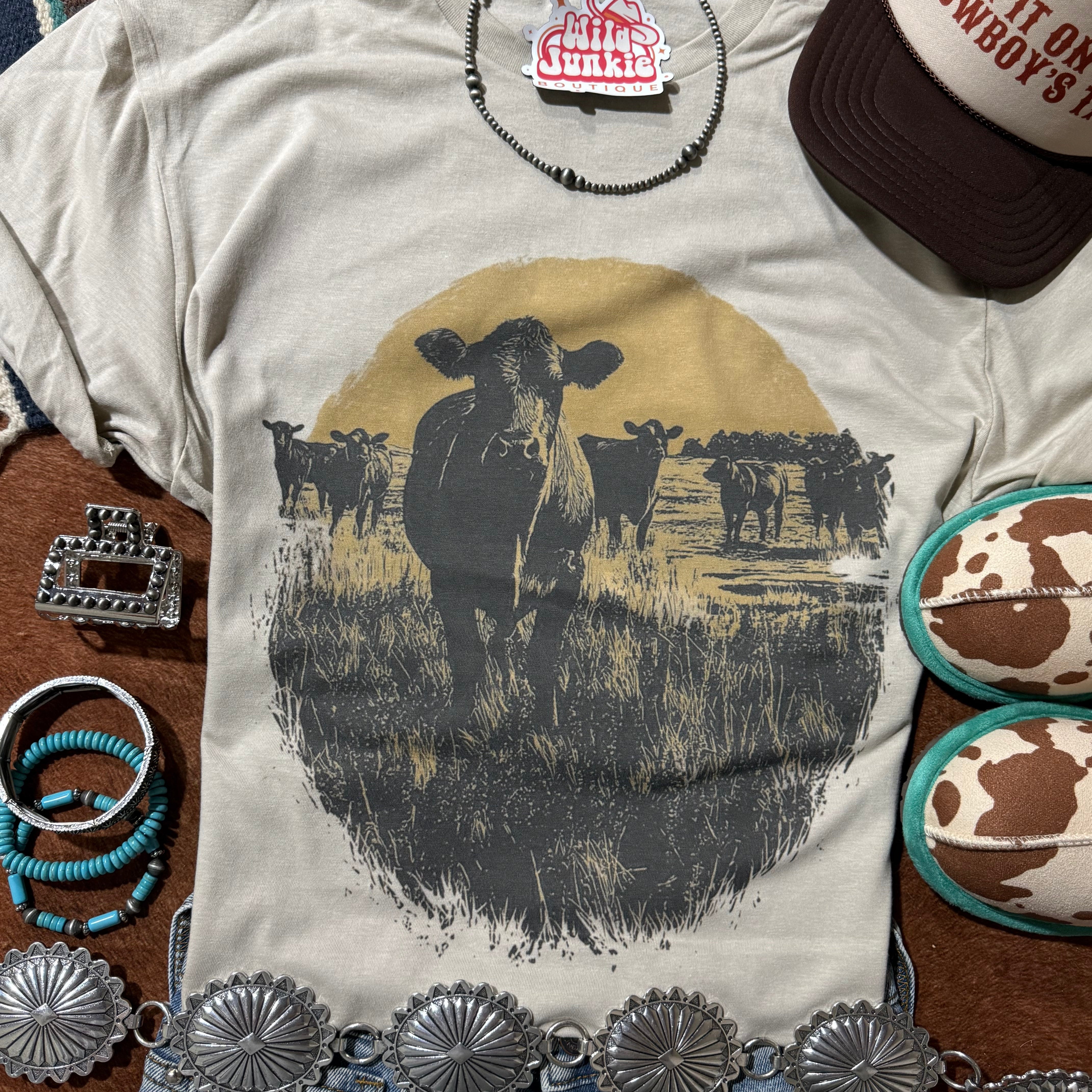 Wild Junkie Pasture Sunset Graphic Tee featuring a vibrant sunset landscape and casual fit, perfect for outdoor-inspired style.