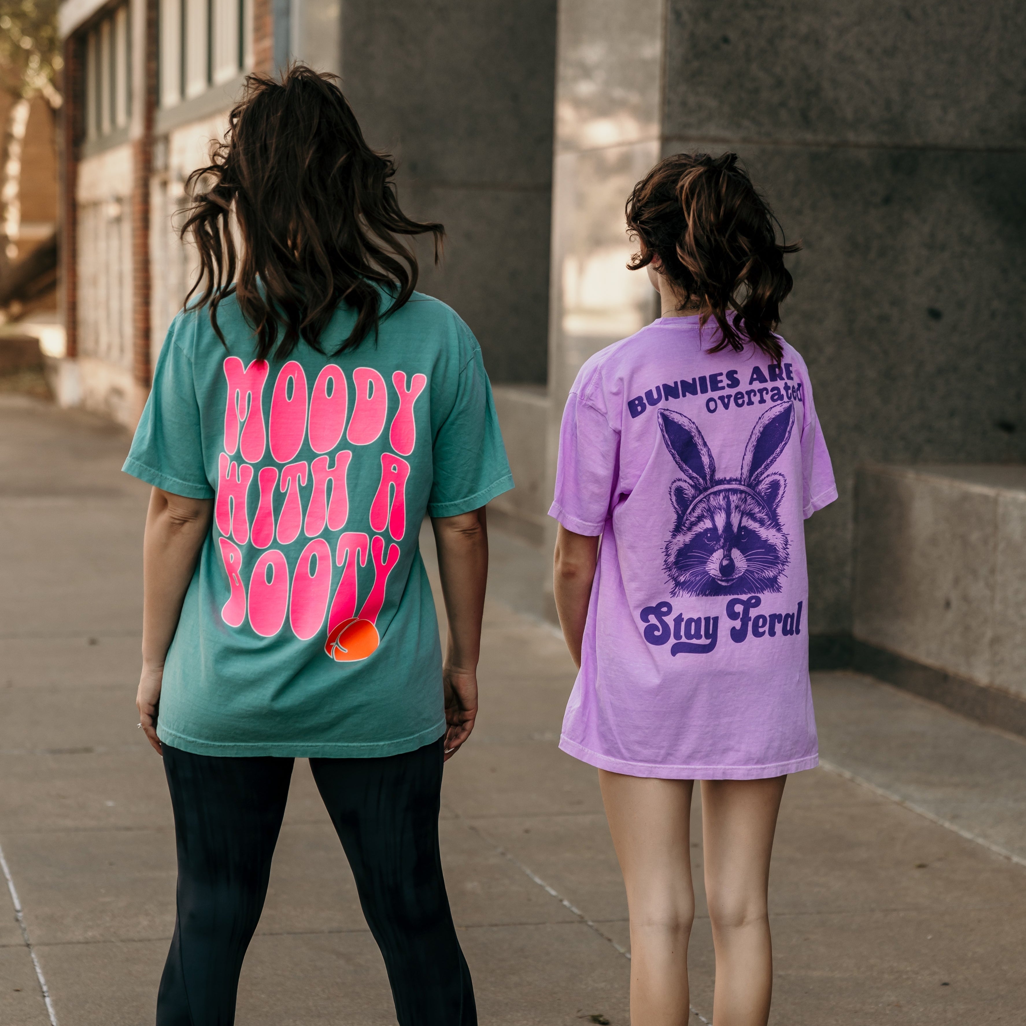 Moody with a Booty graphic T-shirt from Shop Karma Tees, featuring bold print on a casual, comfortable cotton tee.