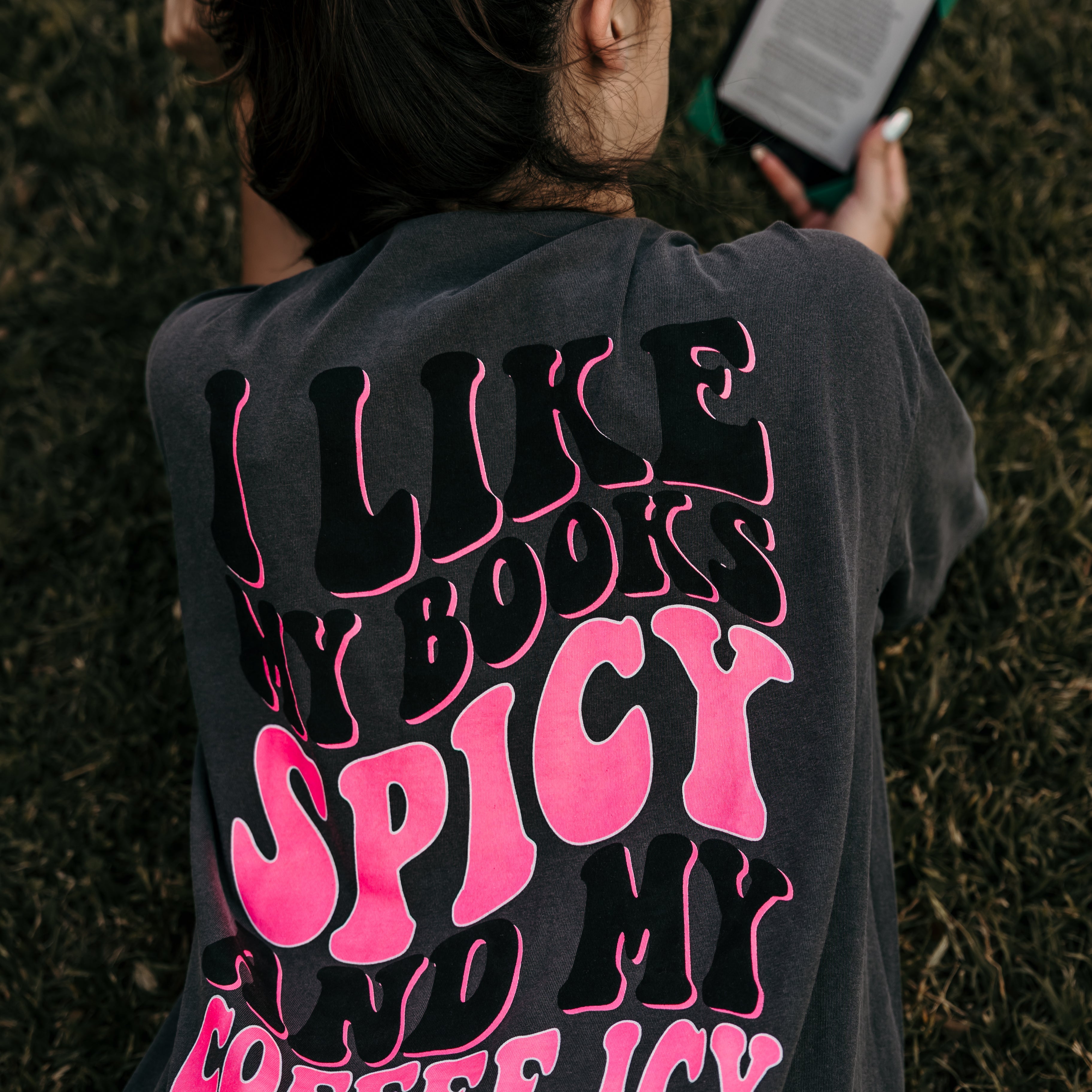 Spicy Books graphic T-shirt by Shop Karma Tees featuring bold printed design on soft cotton fabric.