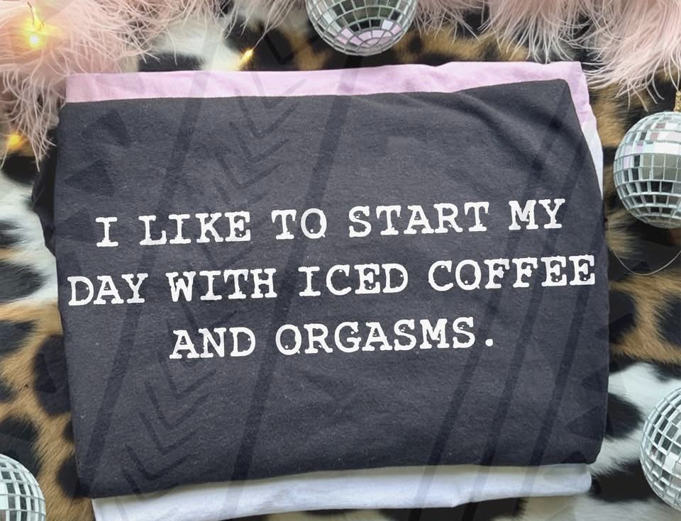 Black graphic tee from Anchored Grace Boutique with "I Like to Start My Day" slogan in stylish white font.