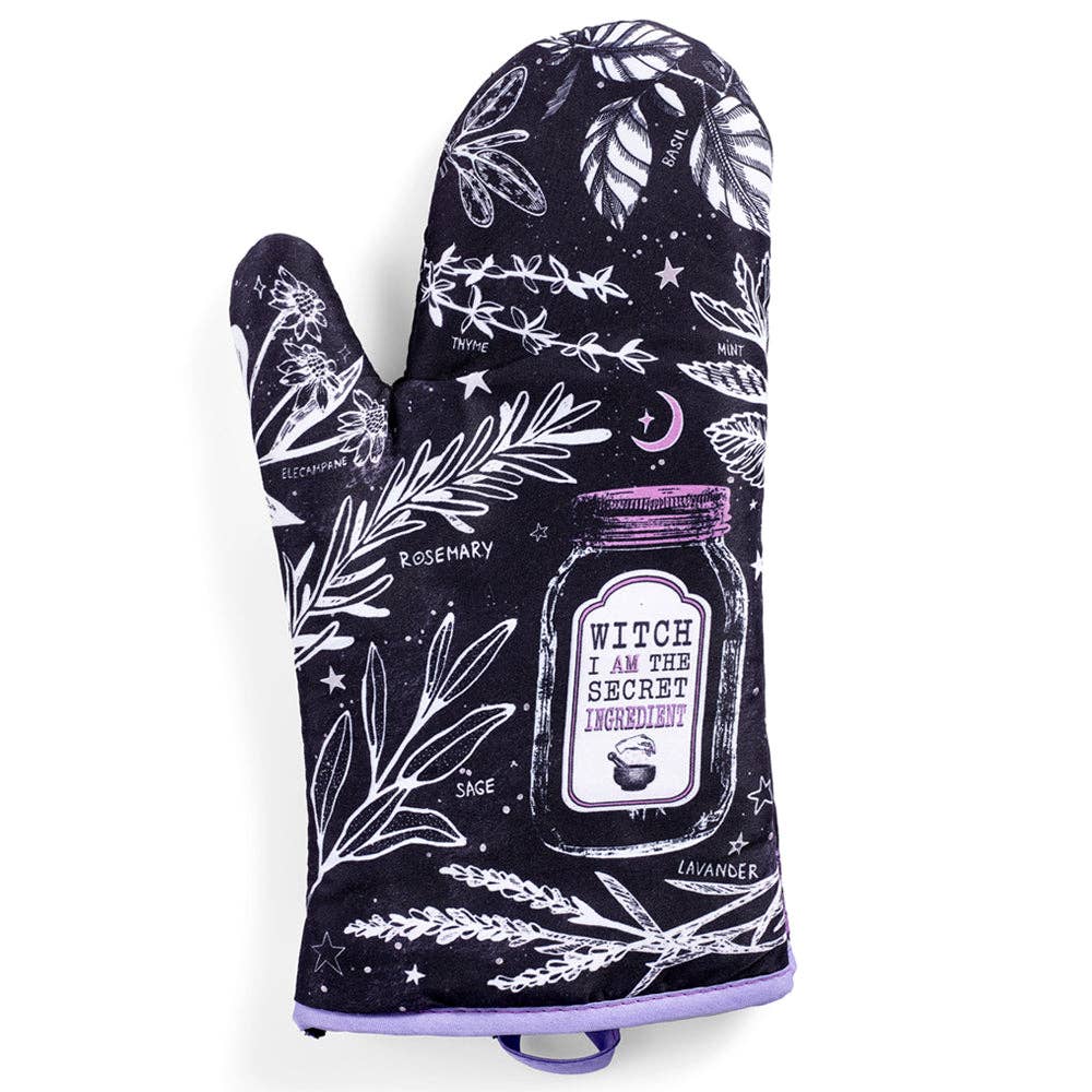 Set of 2 witch-themed oven mitts and pot holders from The Bullish Store, hanging with colorful fabric and Halloween design.