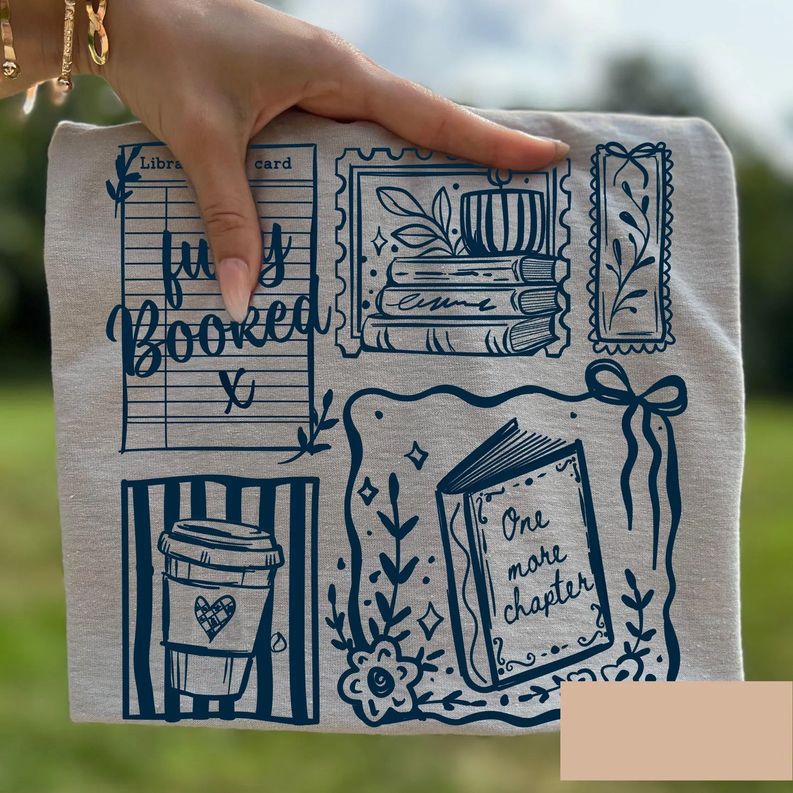 Fully Booked graphic tee by Anchored Grace Boutique featuring a stylish design on a comfortable cotton t-shirt.