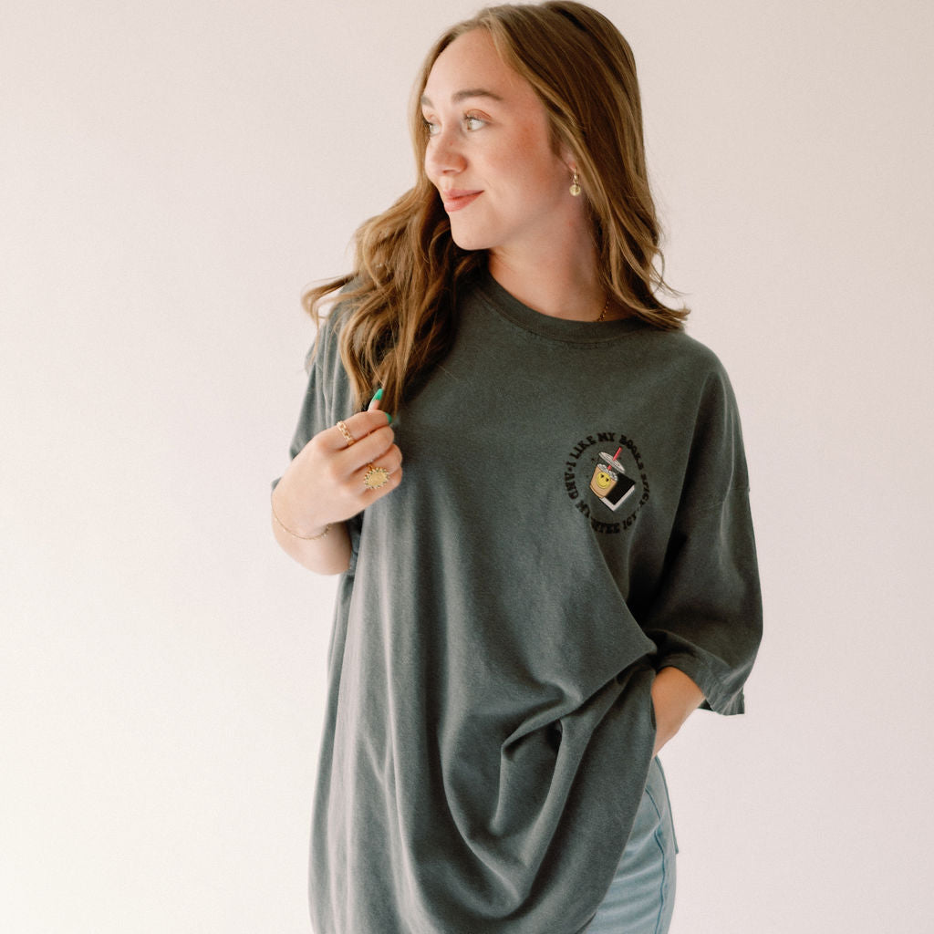Spicy Books graphic T-shirt from Shop Karma Tees featuring bold printed design on a casual cotton tee.