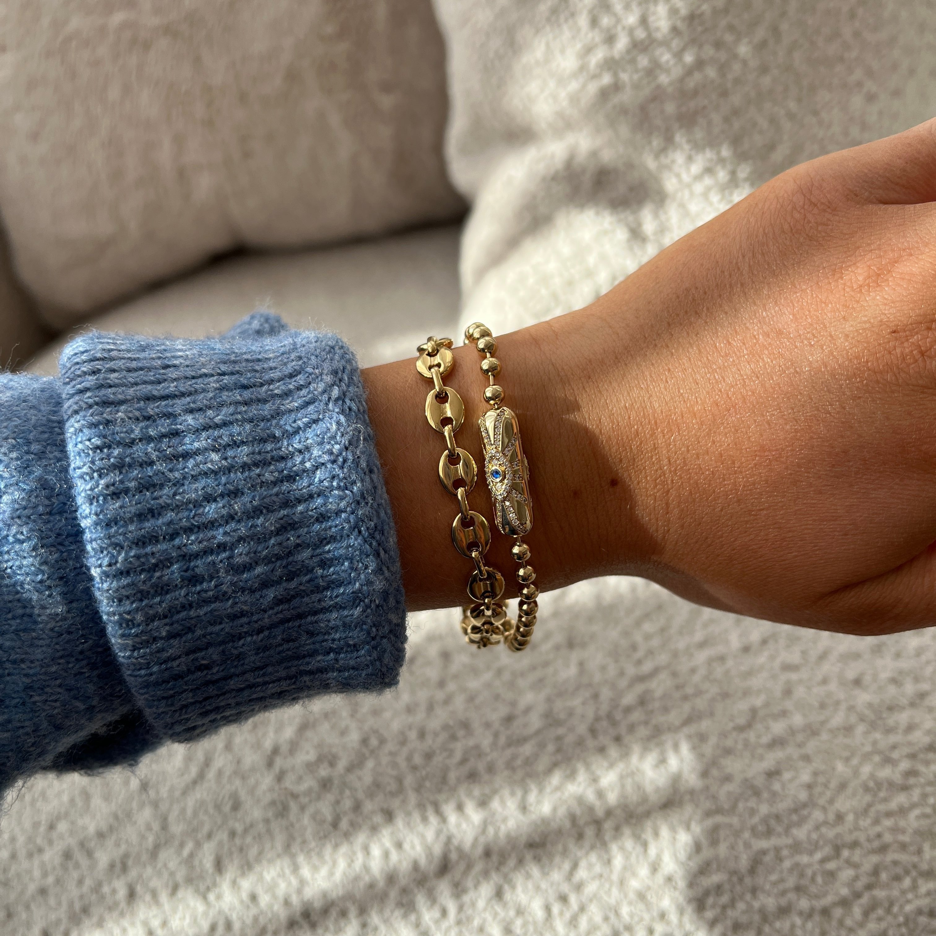 Gold Evil Eye Barrel Closure Bracelet by ALEX AND ANI featuring a protective evil eye charm and sleek barrel clasp.