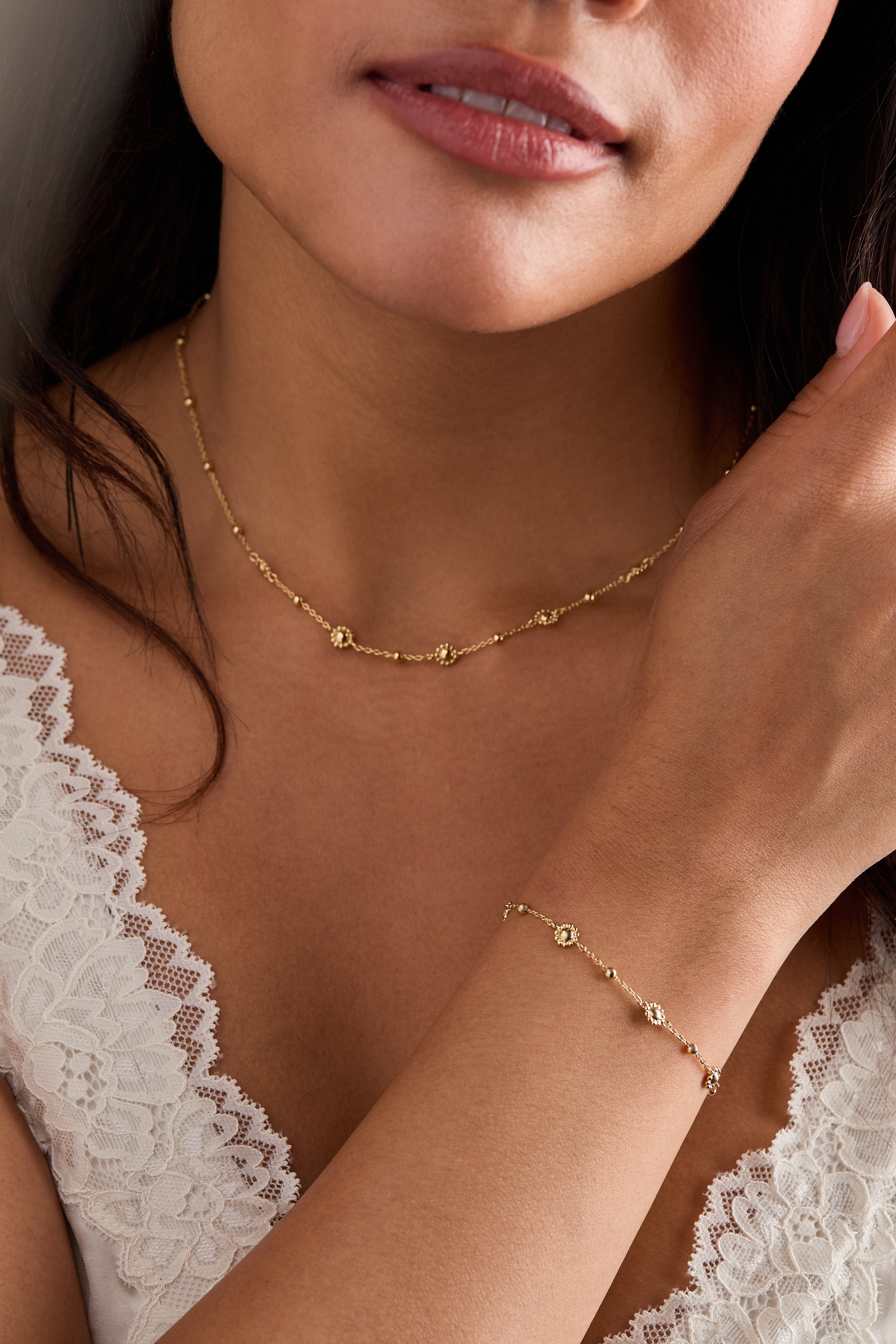 Gold Floret Chain Bracelet by ALEX AND ANI, featuring delicate floral links and adjustable chain for a stylish accessory.
