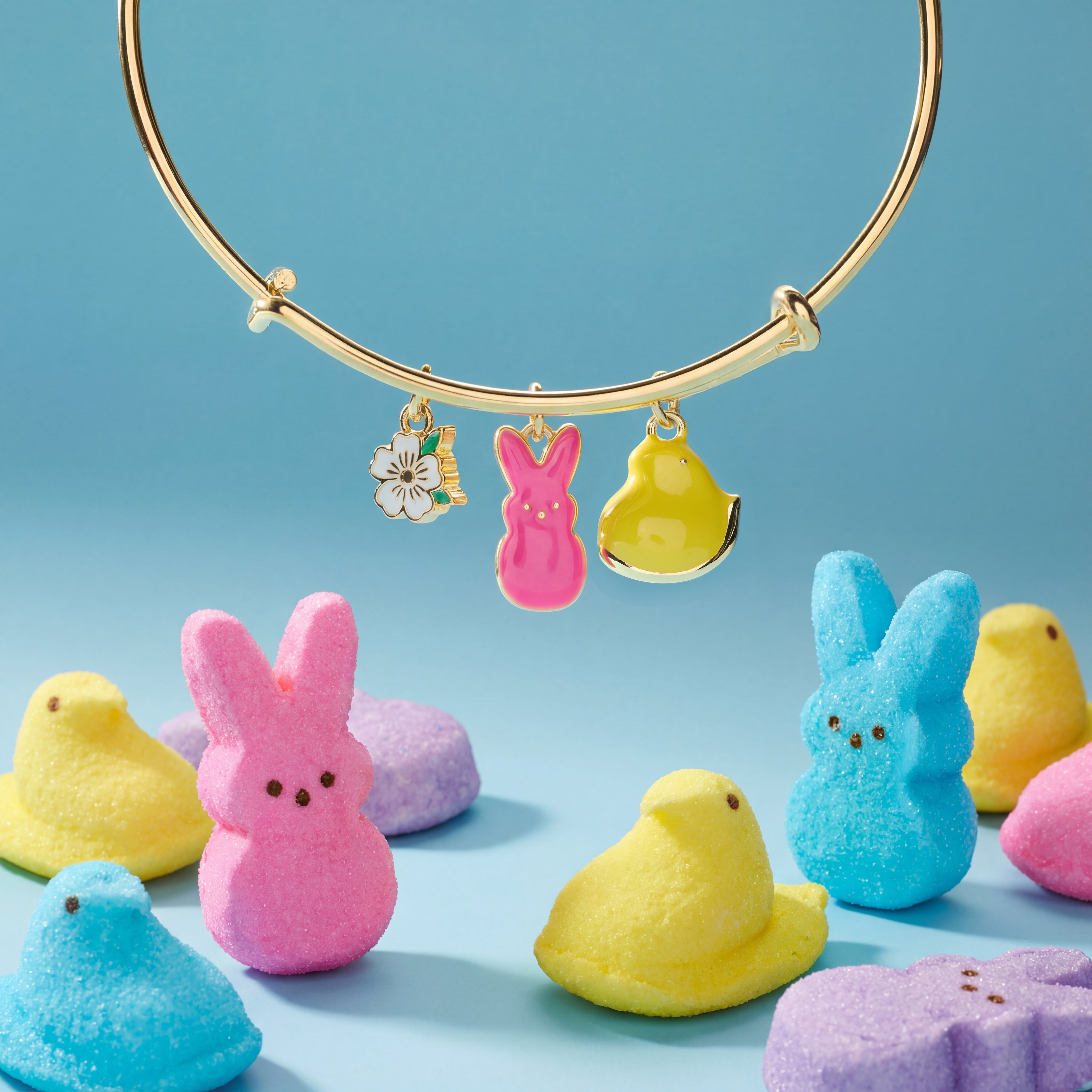 Gold ALEX AND ANI PEEPS Chick and Bunny multi charm bracelet featuring colorful charms on a delicate bangle.