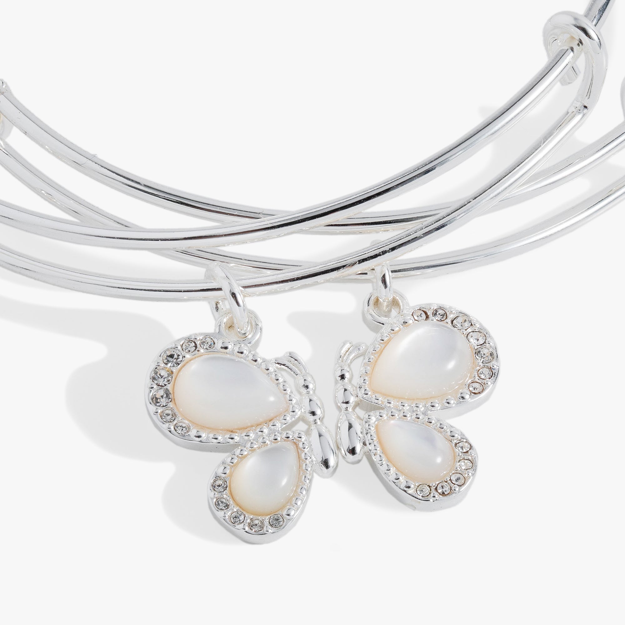 ALEX AND ANI gold butterfly wings bangle set of 2 bracelets with delicate butterfly wing charms, perfect for stacking or everyday wear.