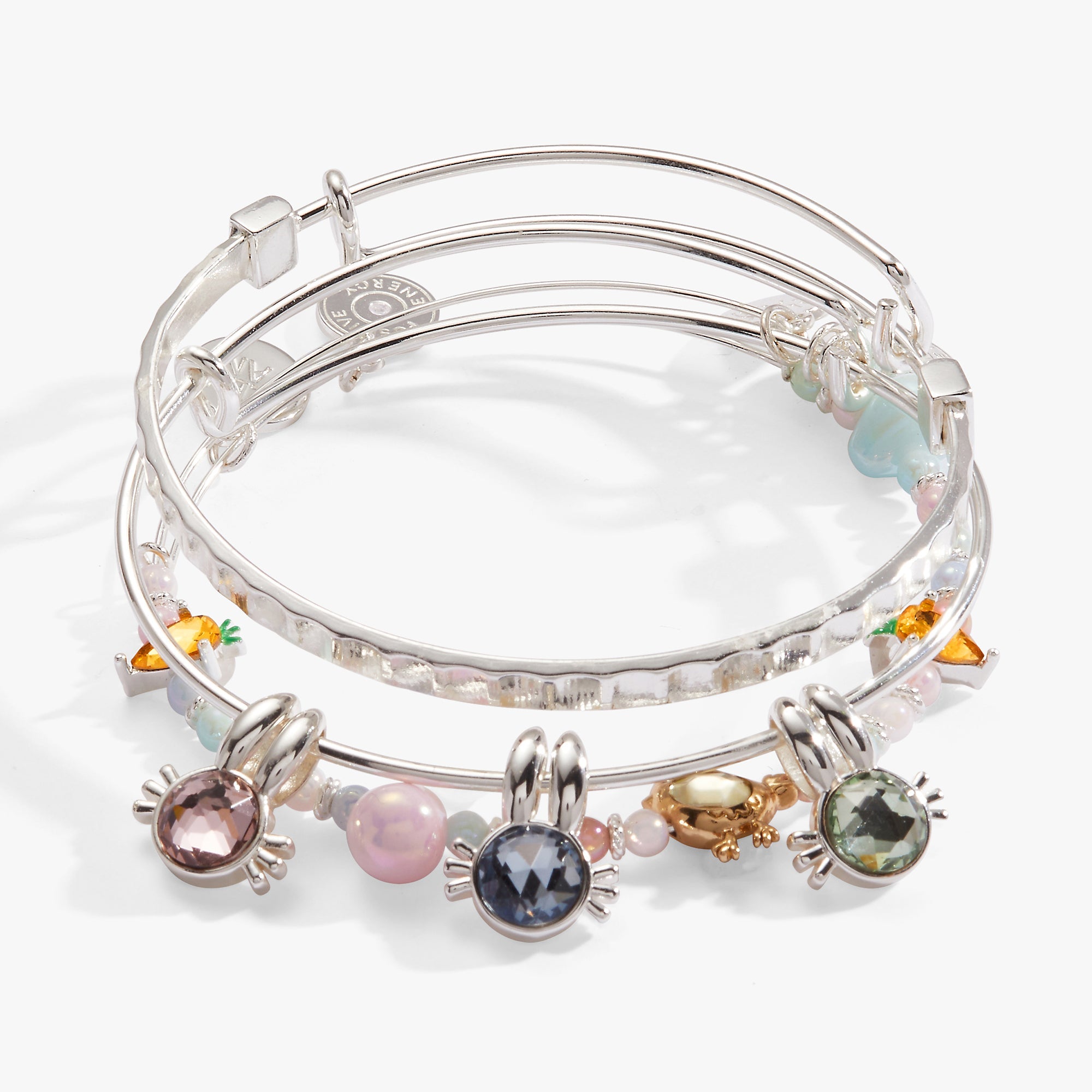 Set of three silver crystal bunny bangles by ALEX AND ANI, featuring sparkling accents and delicate bracelet designs.