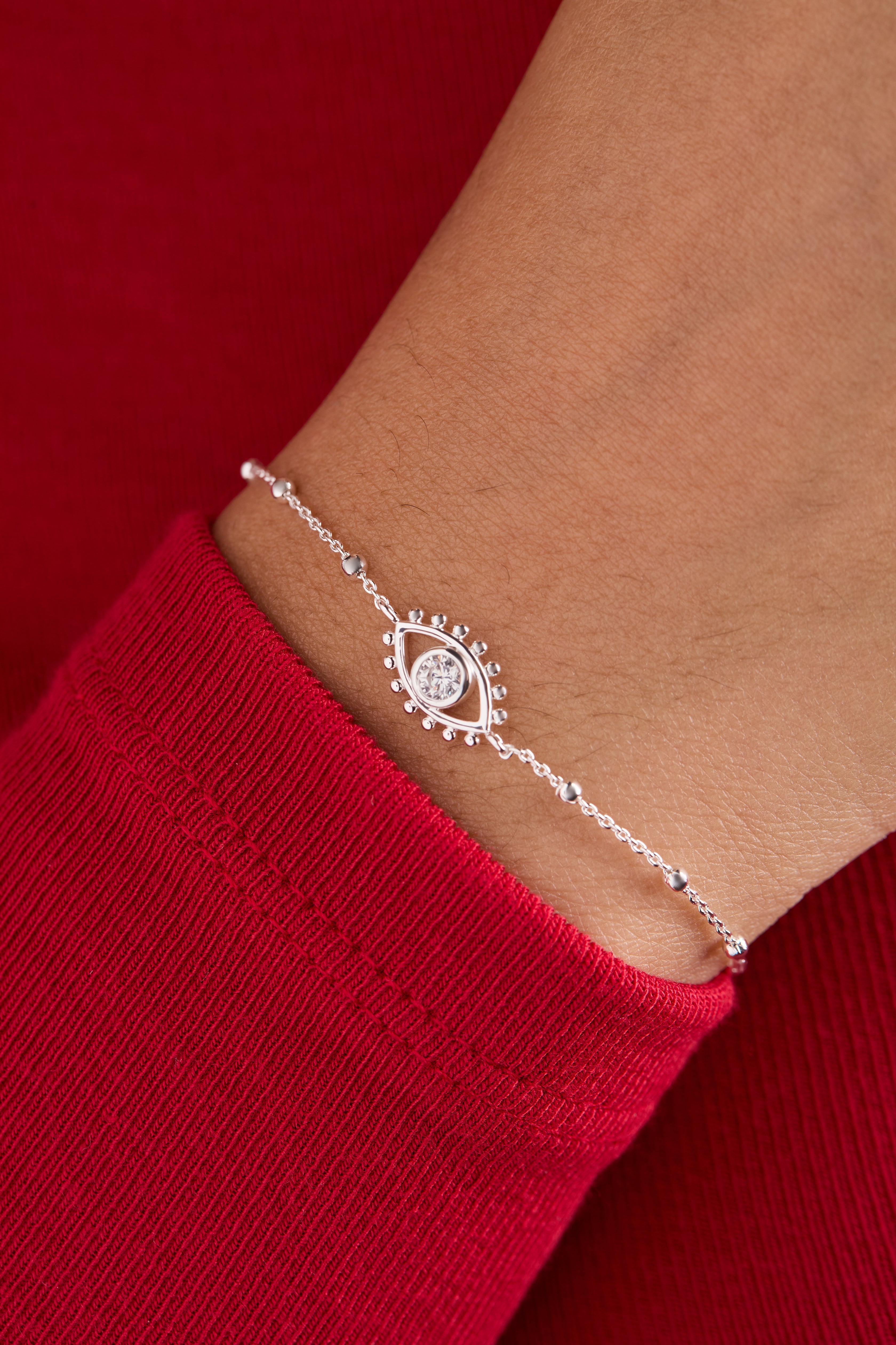 Silver Evil Eye Inline Bracelet by ALEX AND ANI featuring a delicate chain and eye charm, stylish and protective jewelry piece.