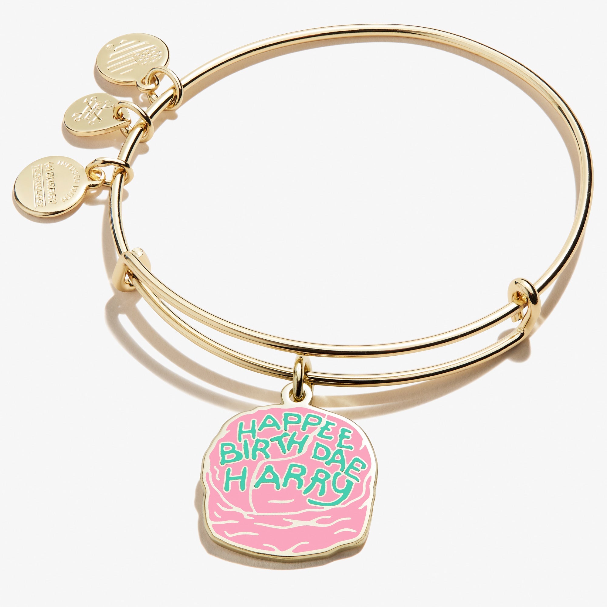 Silver Harry Potter Celebrate Cake Charm Bangle bracelet by ALEX AND ANI featuring a Harry Potter-themed cake charm.