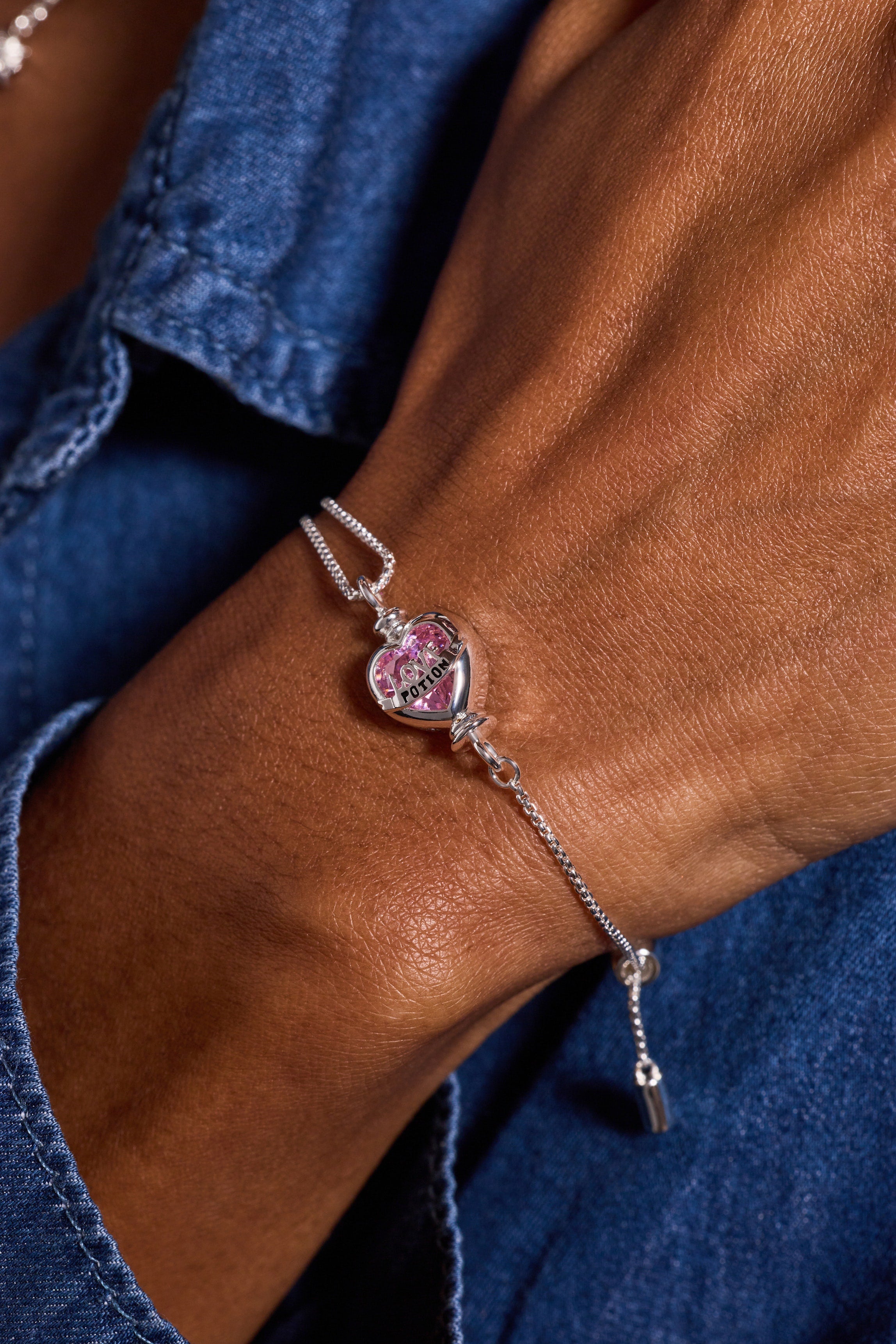 Silver Harry Potter Love Potion crystal pull chain bracelet by ALEX AND ANI featuring magical charm and sparkling accents.