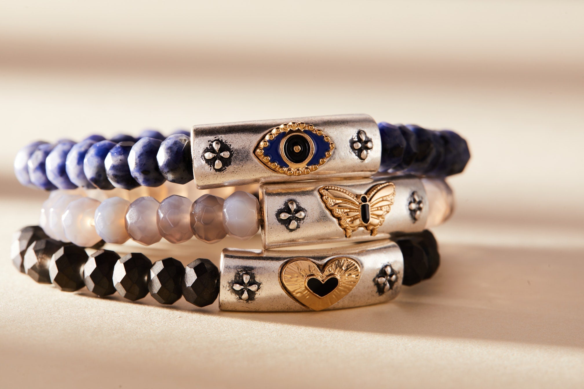 Two-tone antique evil eye stretch bracelet by ALEX AND ANI featuring a protective evil eye charm and elegant design.
