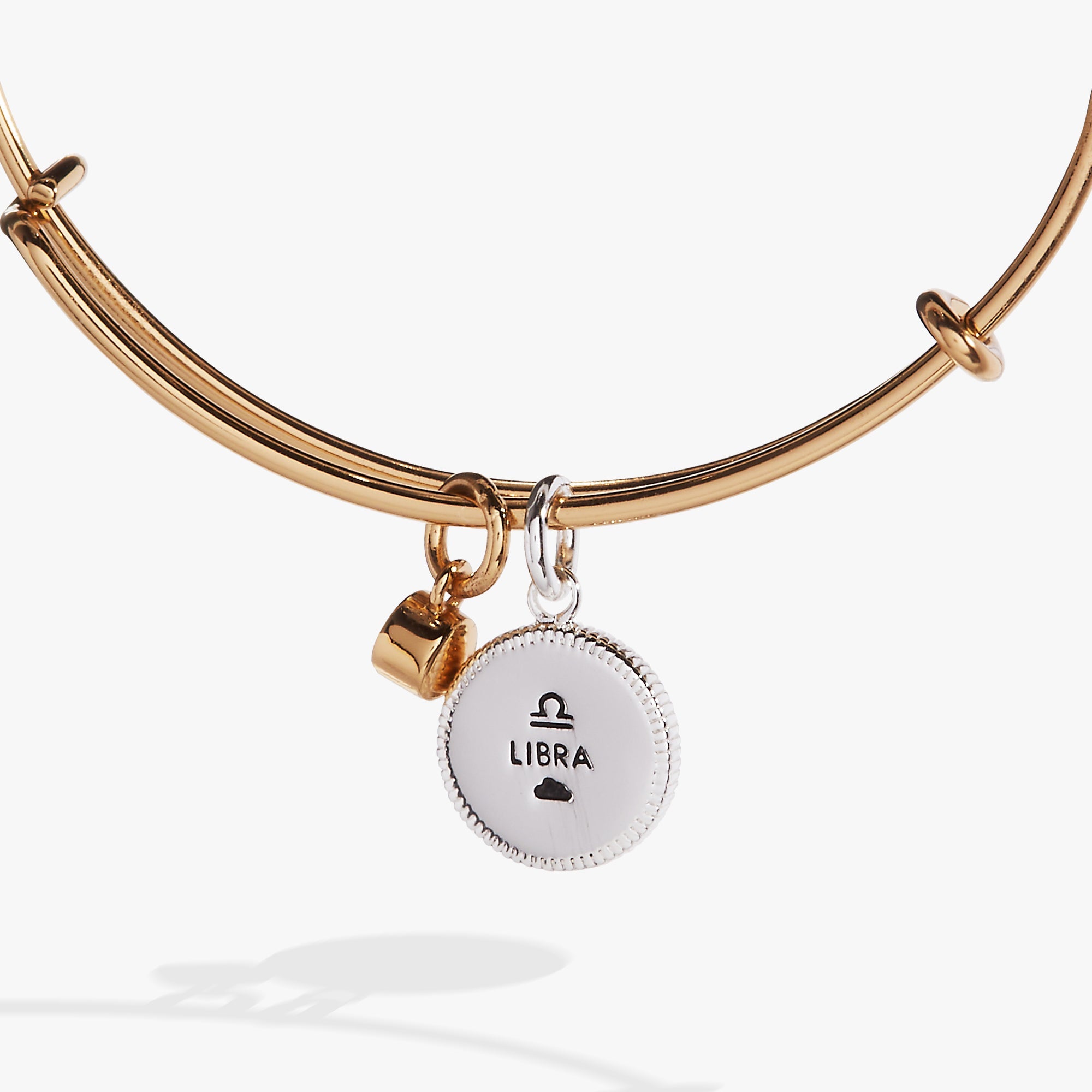 Two-tone Libra Zodiac charm bangle bracelet by ALEX AND ANI featuring a celestial Libra symbol and elegant design.