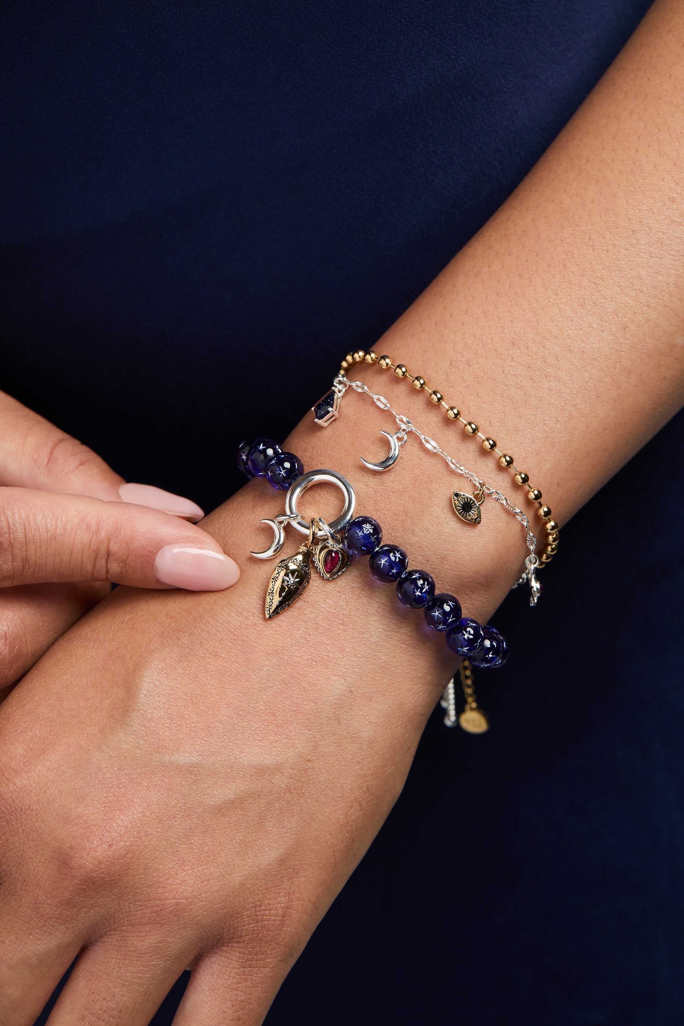 Two-tone Moon Magic 2-Row Charm Bracelet by ALEX AND ANI featuring celestial moon charms and layered design.