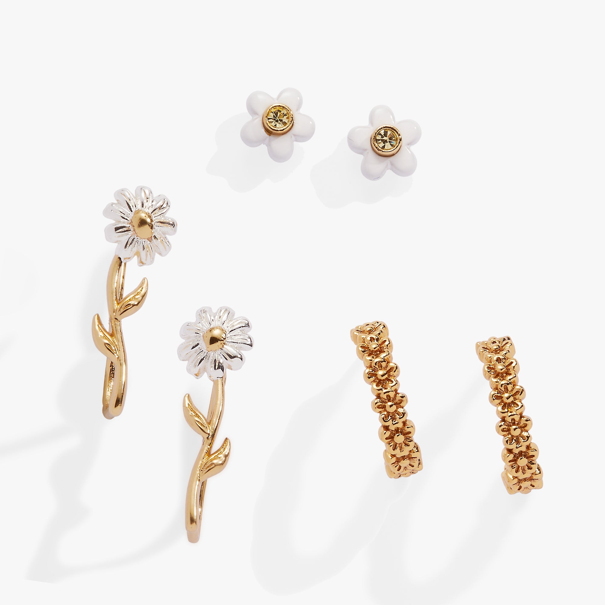 Set of three gold Daisy flower stud and huggie hoop earrings by ALEX AND ANI, featuring floral jewelry design.