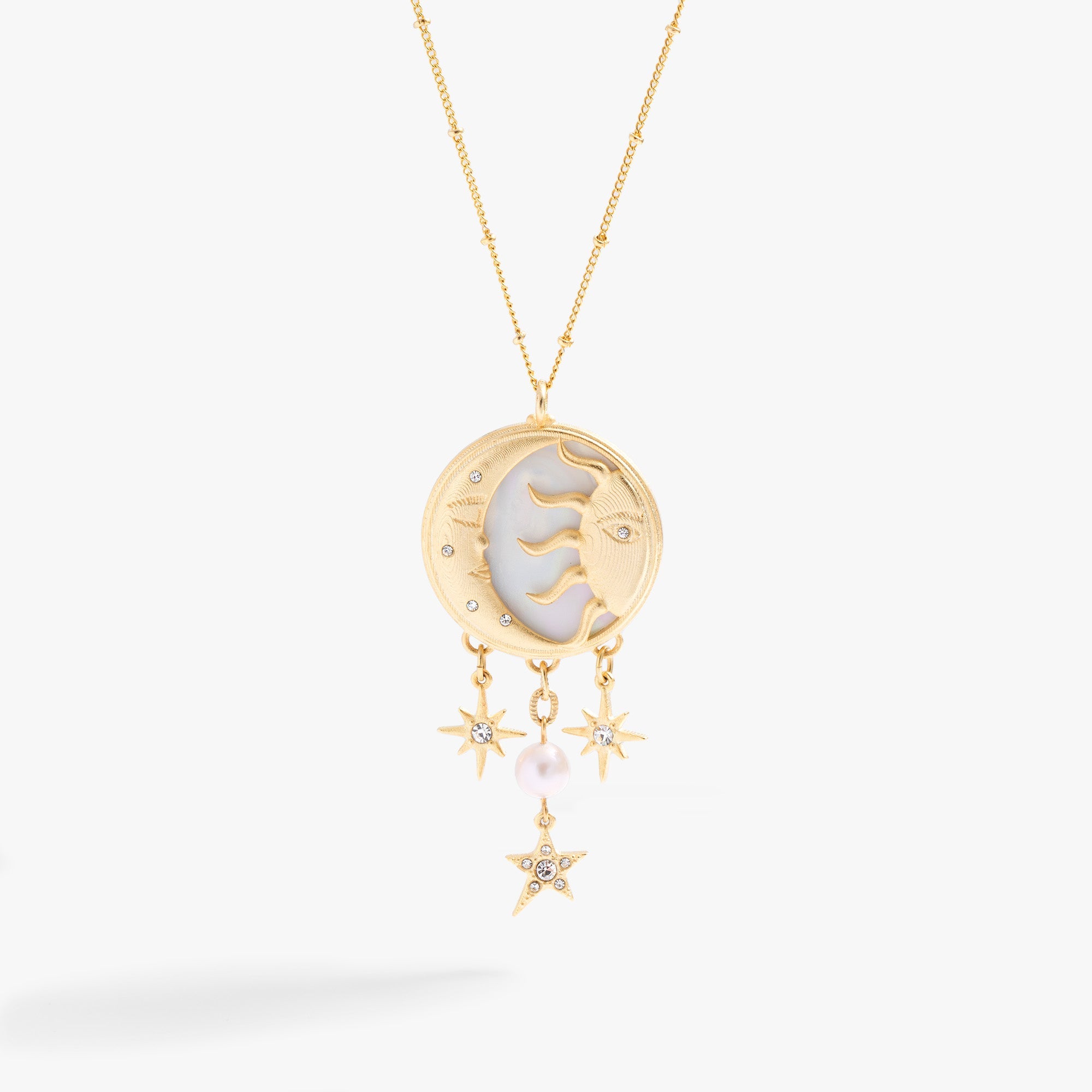 Antique gold Moon and Sun Multicharm Necklace by ALEX AND ANI with celestial charms on a chain.