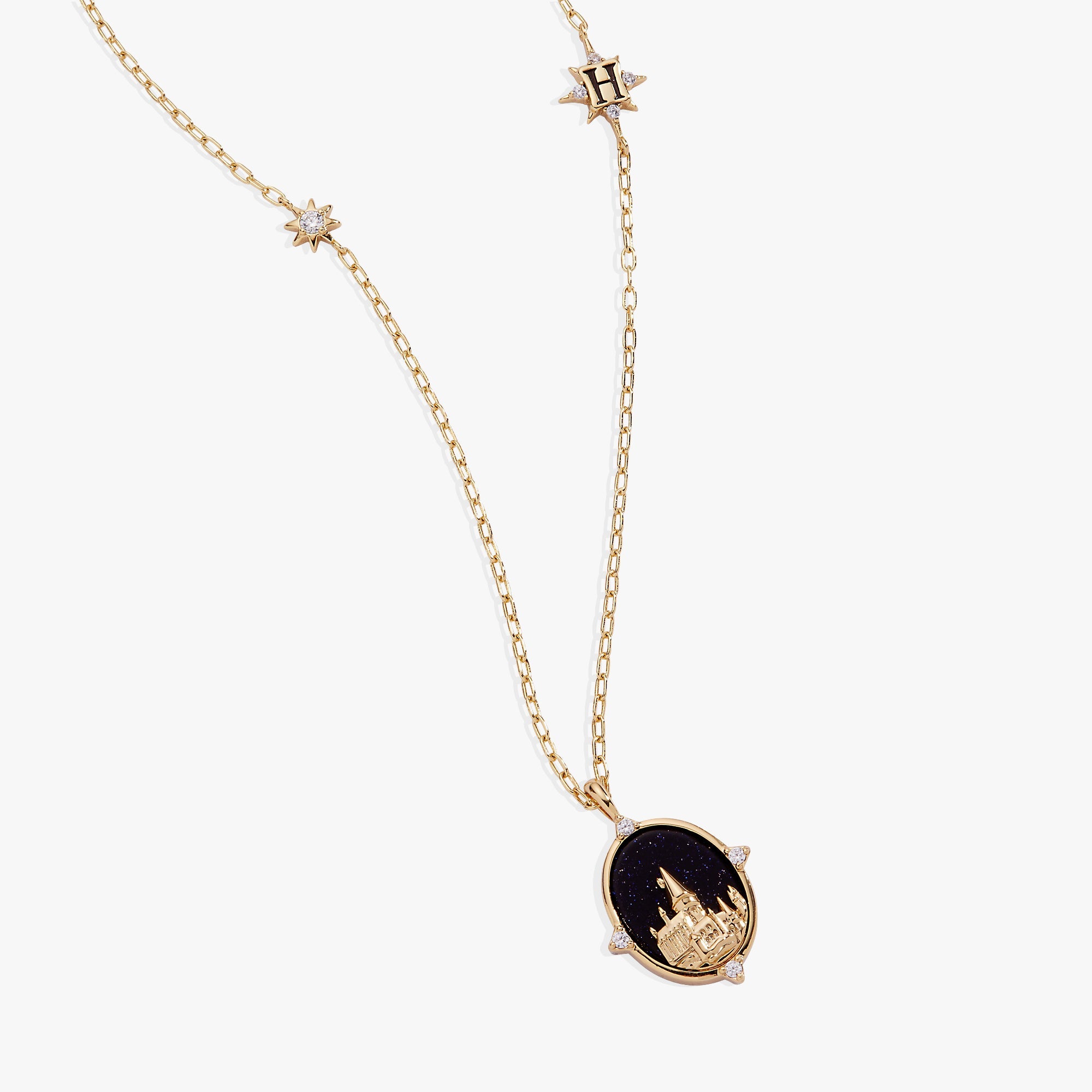 Gold Harry Potter Hogwarts pendant necklace by ALEX AND ANI featuring the iconic Hogwarts crest and magical design.