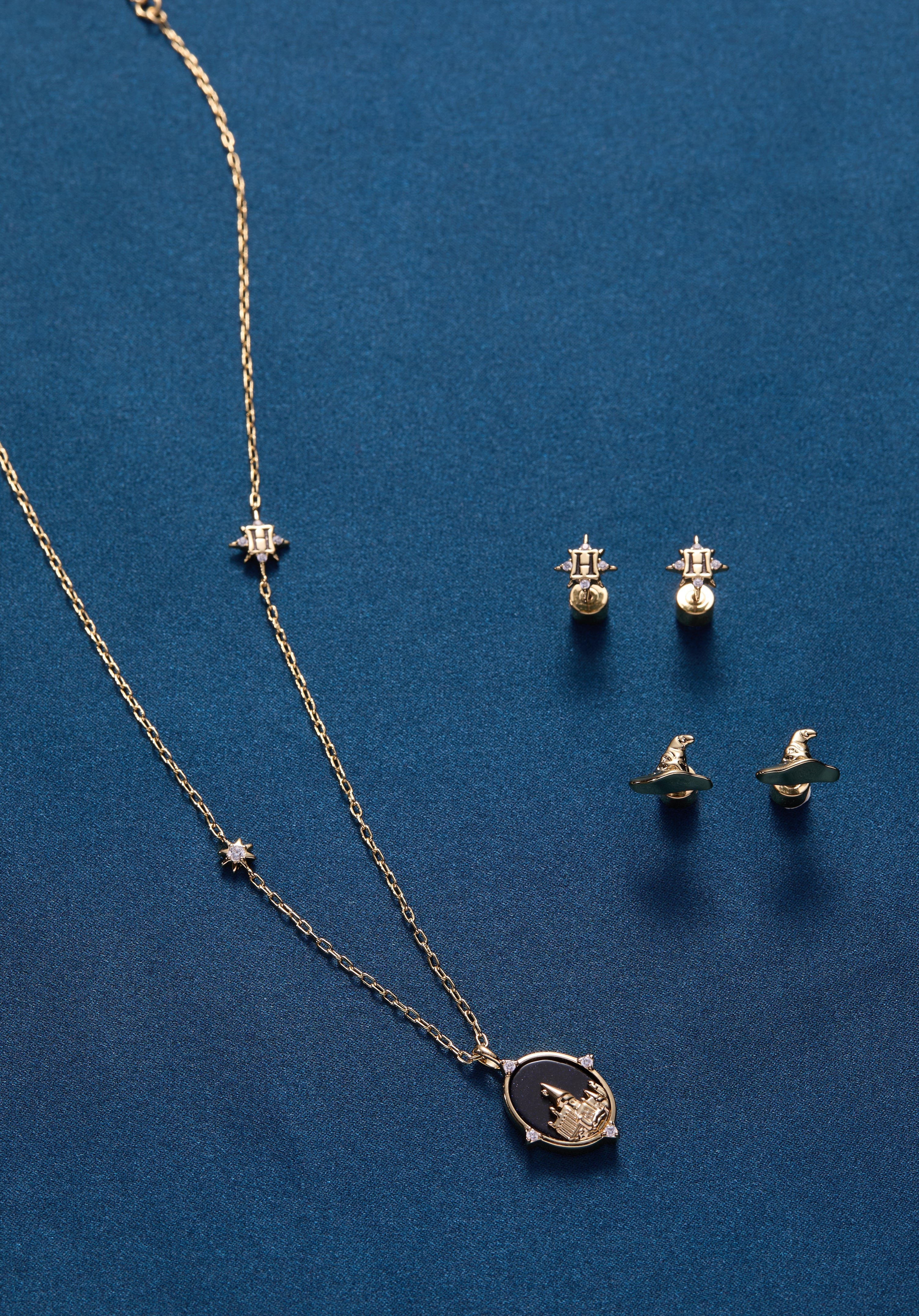 Gold Harry Potter Hogwarts Pendant Necklace by ALEX AND ANI featuring iconic Hogwarts crest and magical design.