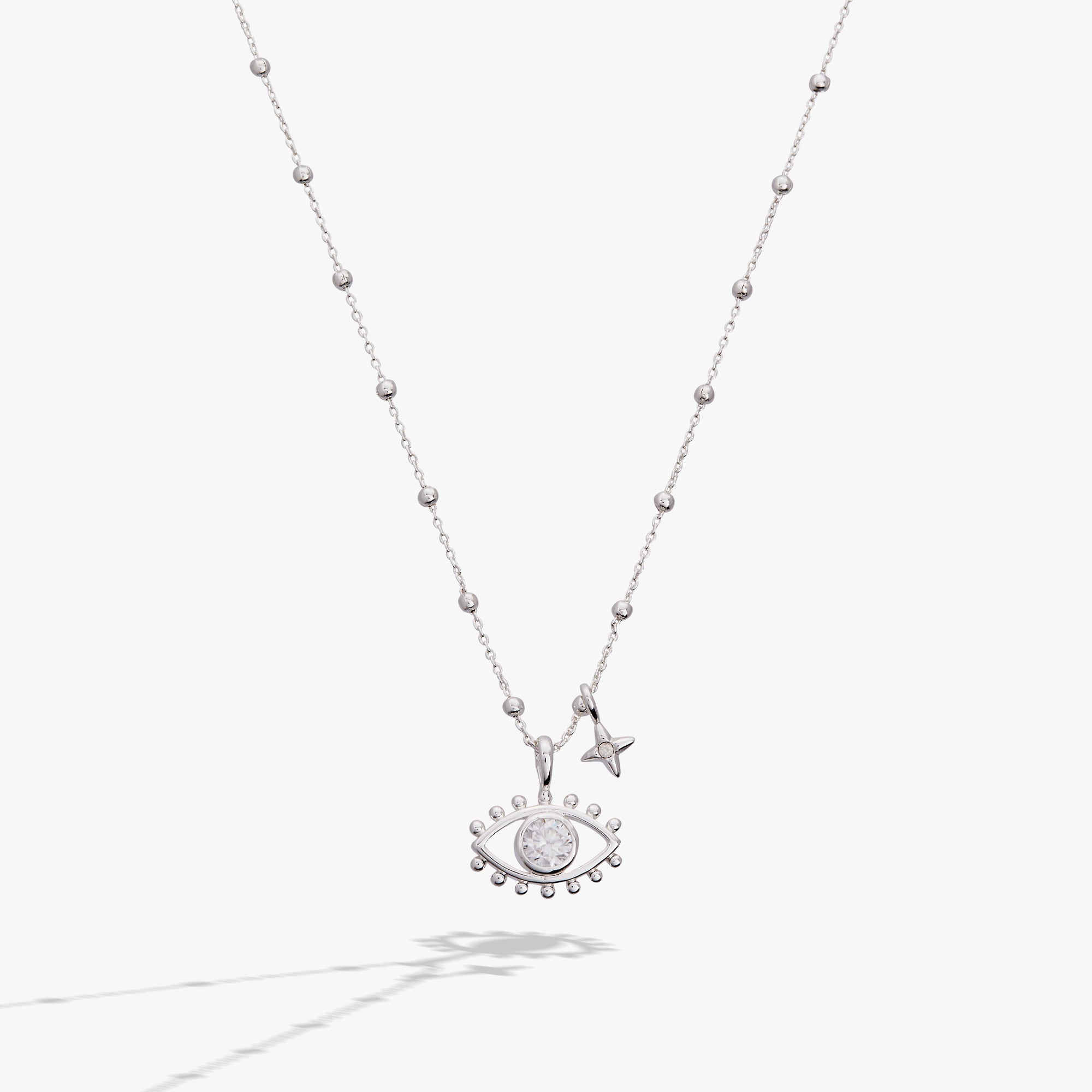 Silver Evil Eye Duo Charm Necklace by ALEX AND ANI featuring two eye-shaped pendants on a delicate chain.