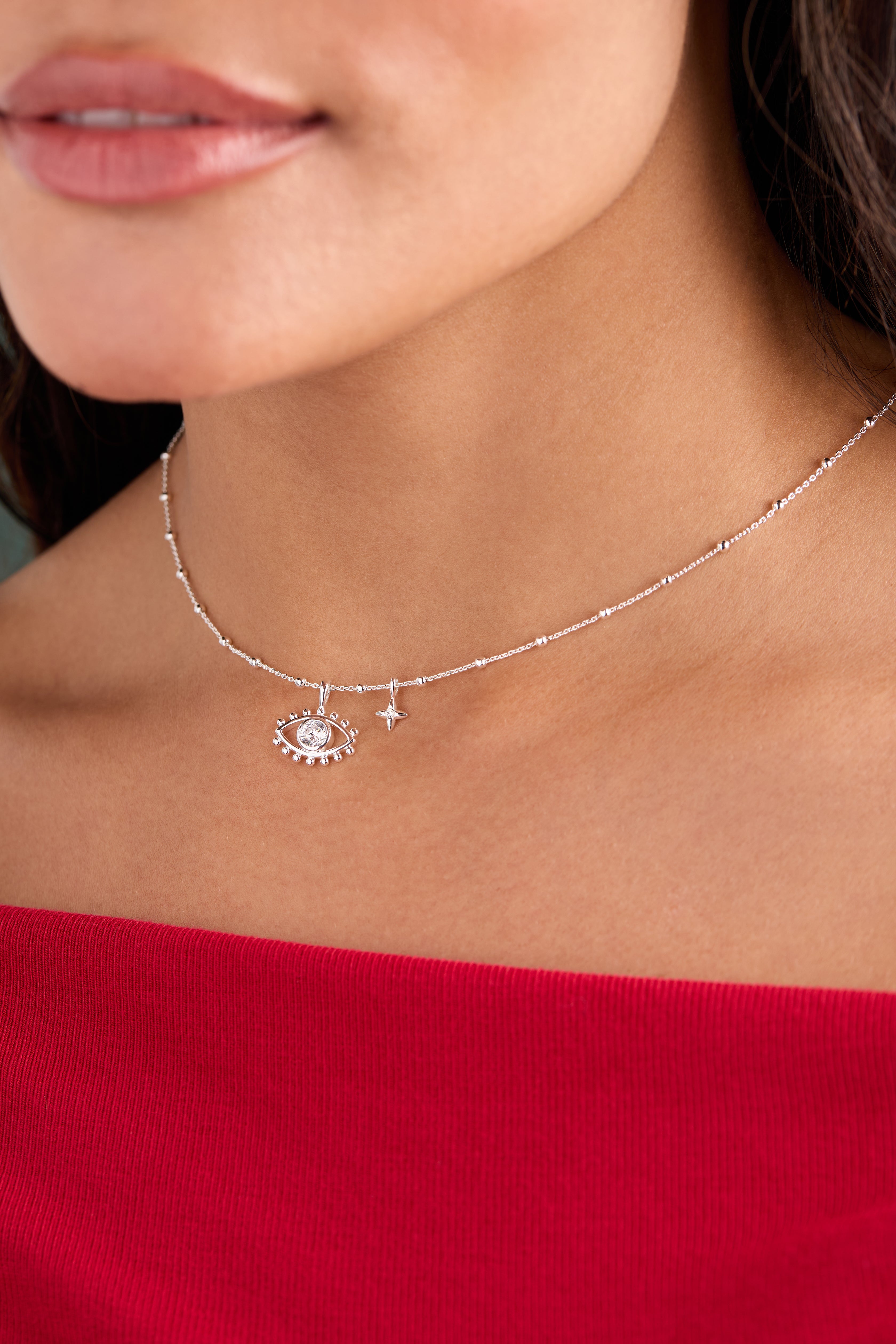 Silver Evil Eye Duo Charm Necklace by ALEX AND ANI featuring two eye-shaped charms on a delicate chain.