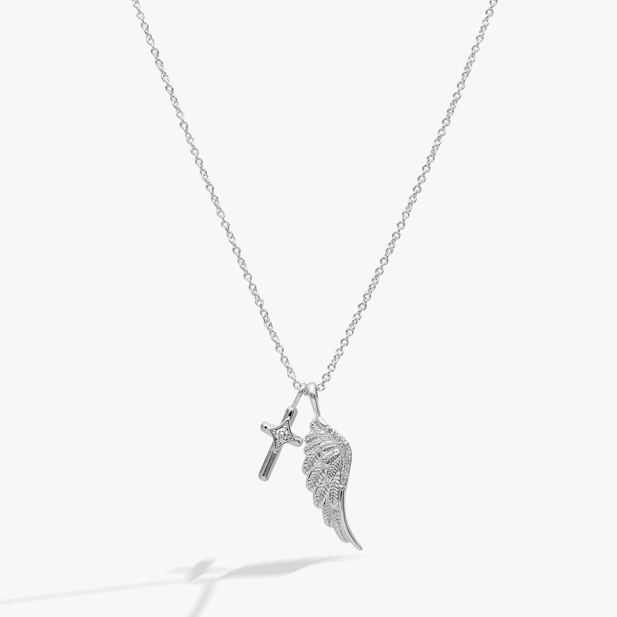 Silver Faith Cross and Angel Wing Charm Necklace by ALEX AND ANI featuring a delicate cross and angel wing pendant.