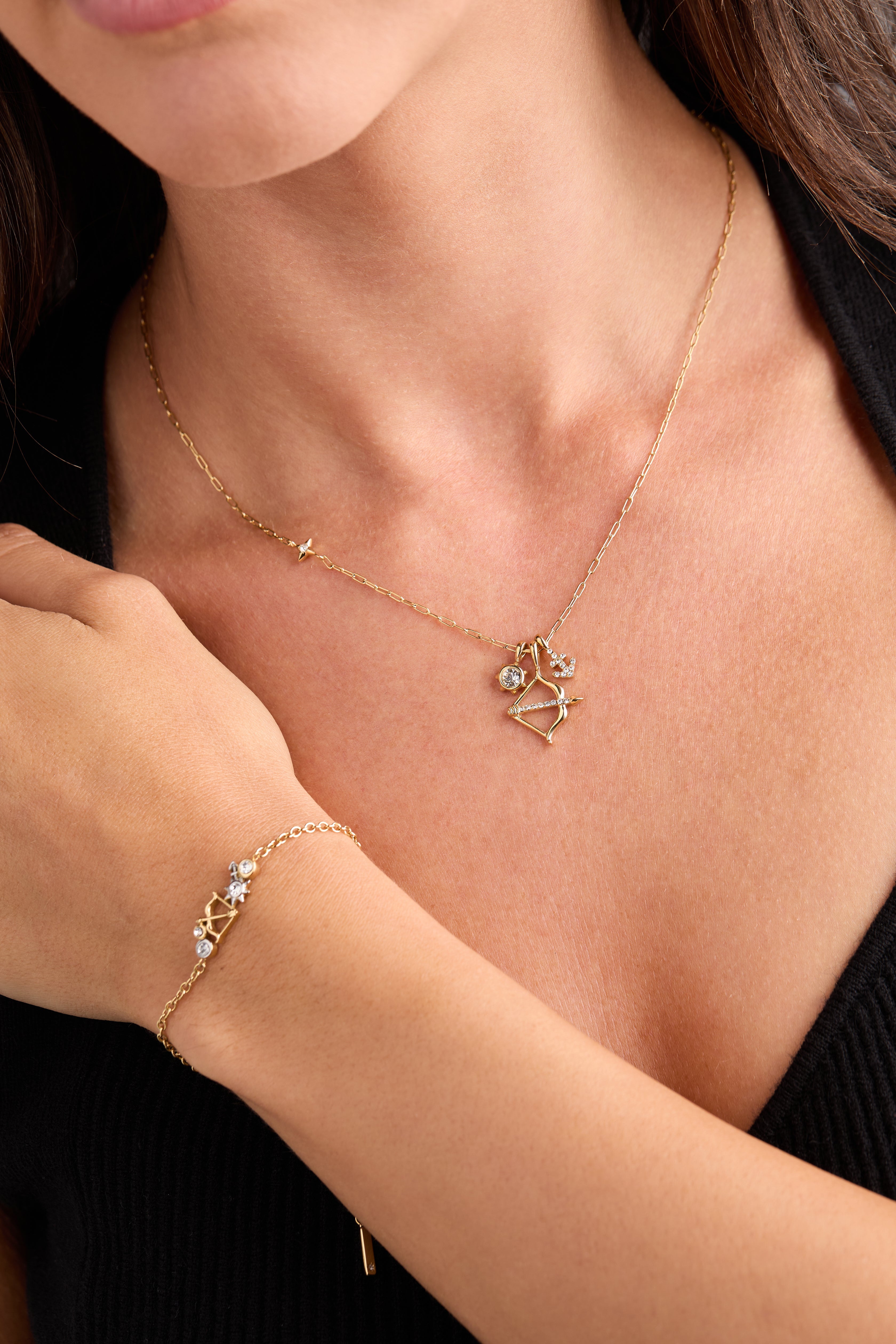 Gold Sagittarius Zodiac Charm Cluster Necklace by ALEX AND ANI featuring stainless steel chain and celestial charm details.
