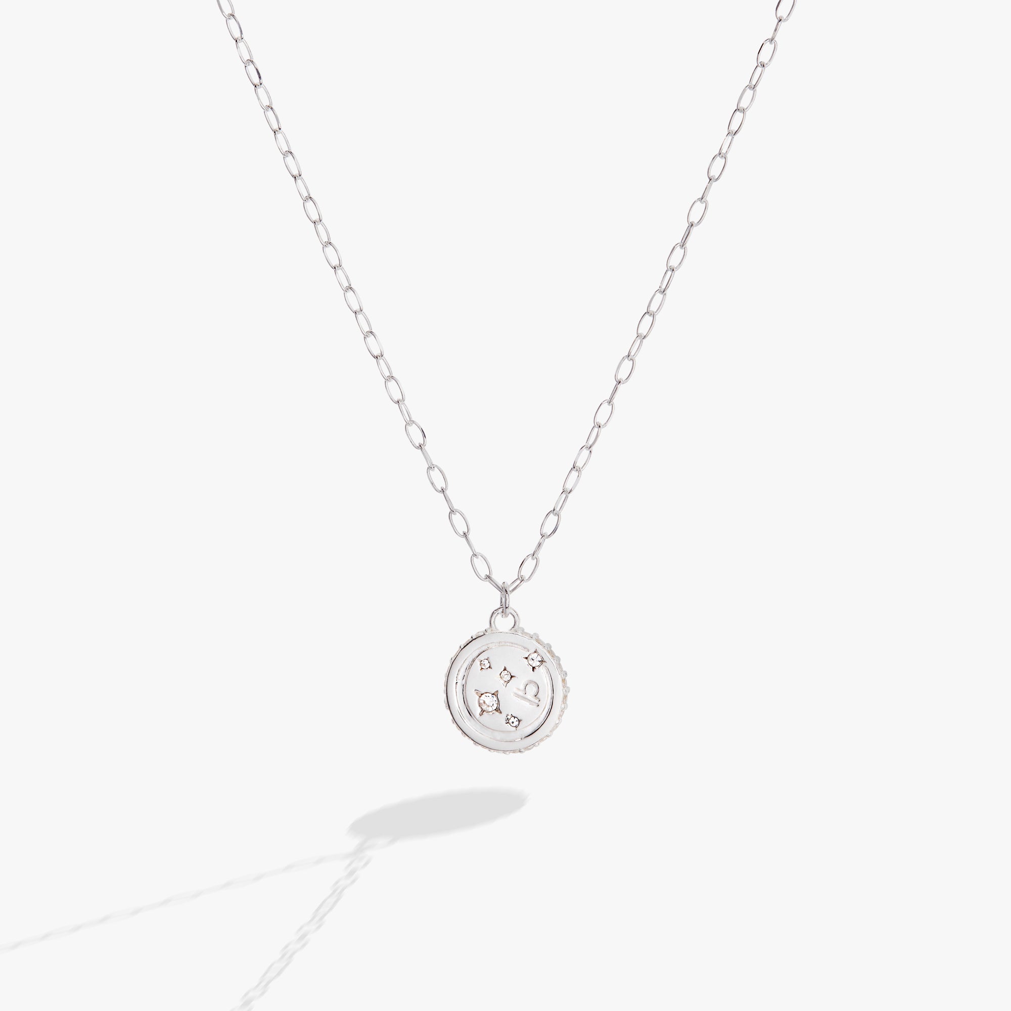 Sterling silver Libra zodiac necklace by ALEX AND ANI featuring a detailed Libra symbol pendant on a delicate chain.