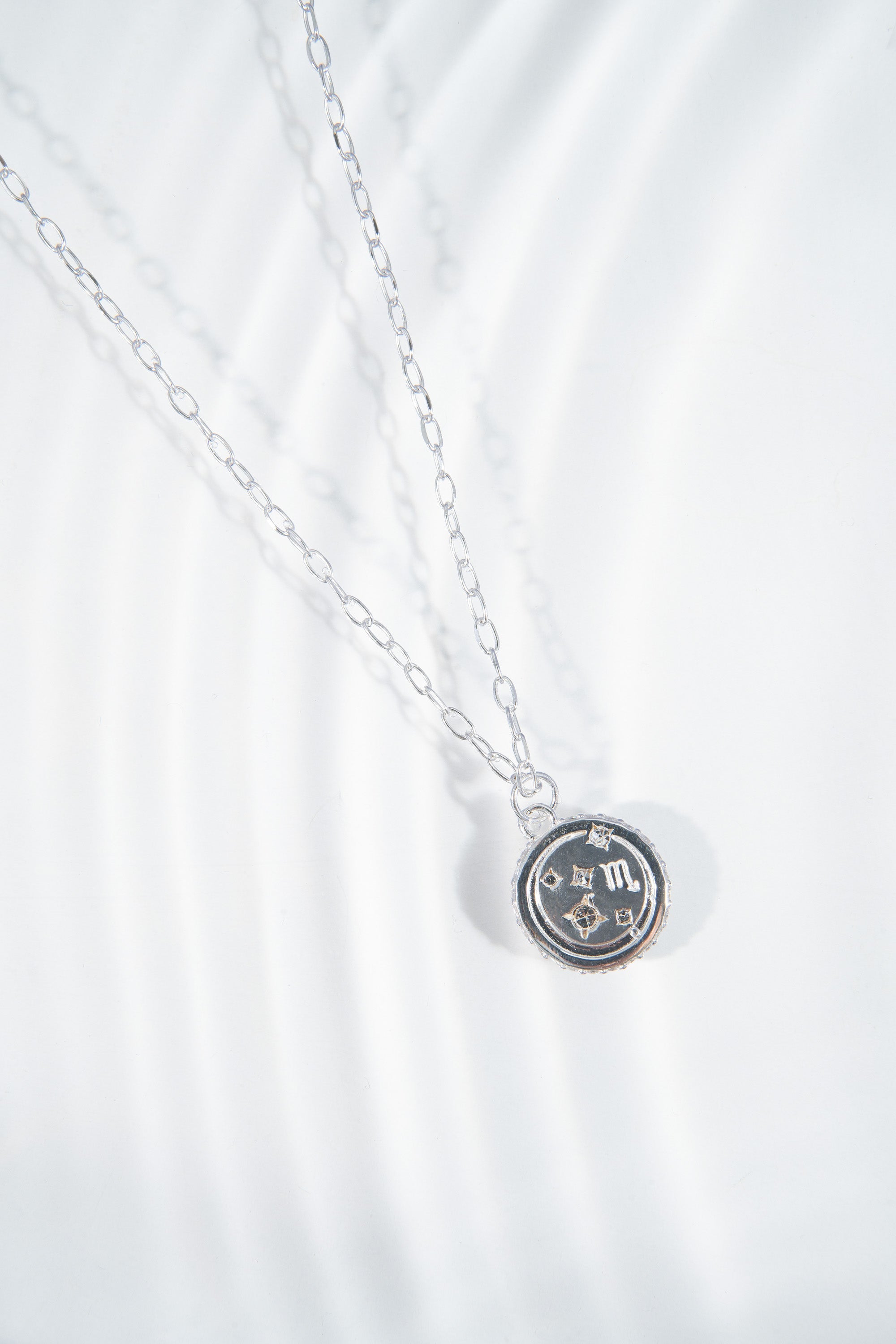Sterling silver Scorpio Zodiac necklace by ALEX AND ANI featuring a detailed Scorpio symbol pendant.