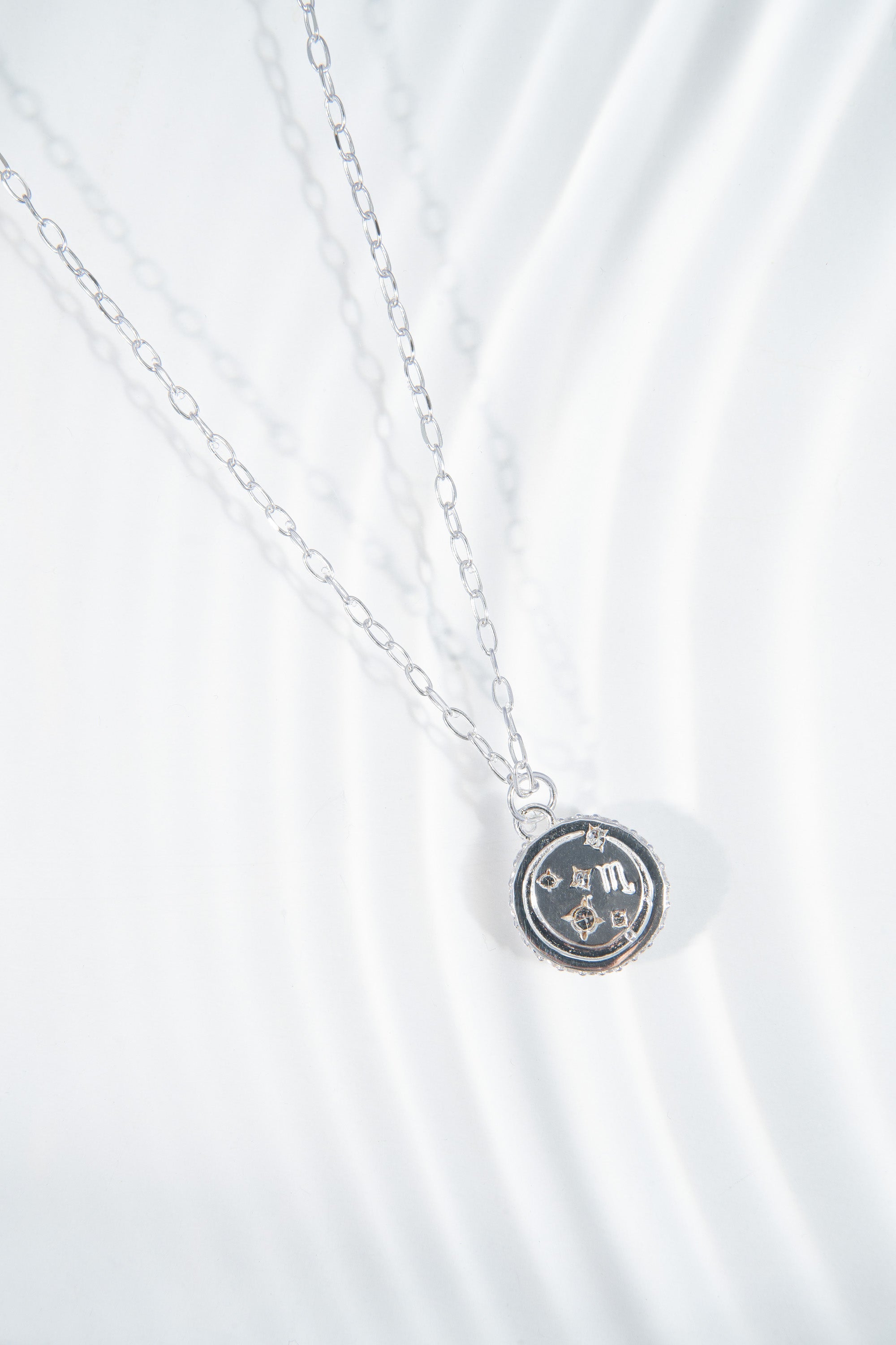 Sterling silver Scorpio Zodiac necklace by ALEX AND ANI featuring a detailed Scorpio symbol pendant.