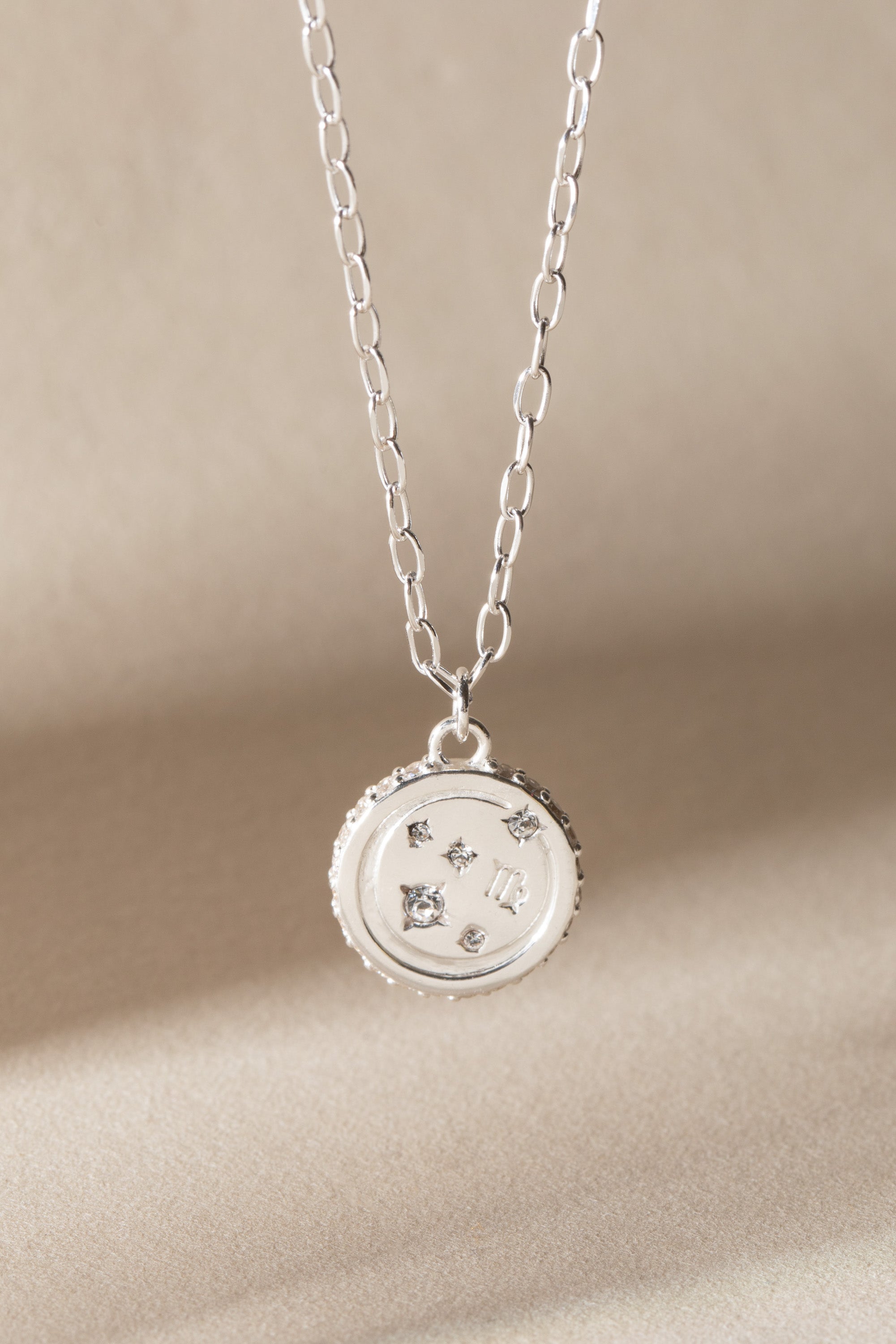 Sterling silver Virgo Zodiac necklace by ALEX AND ANI featuring a detailed Virgo pendant on a delicate chain.