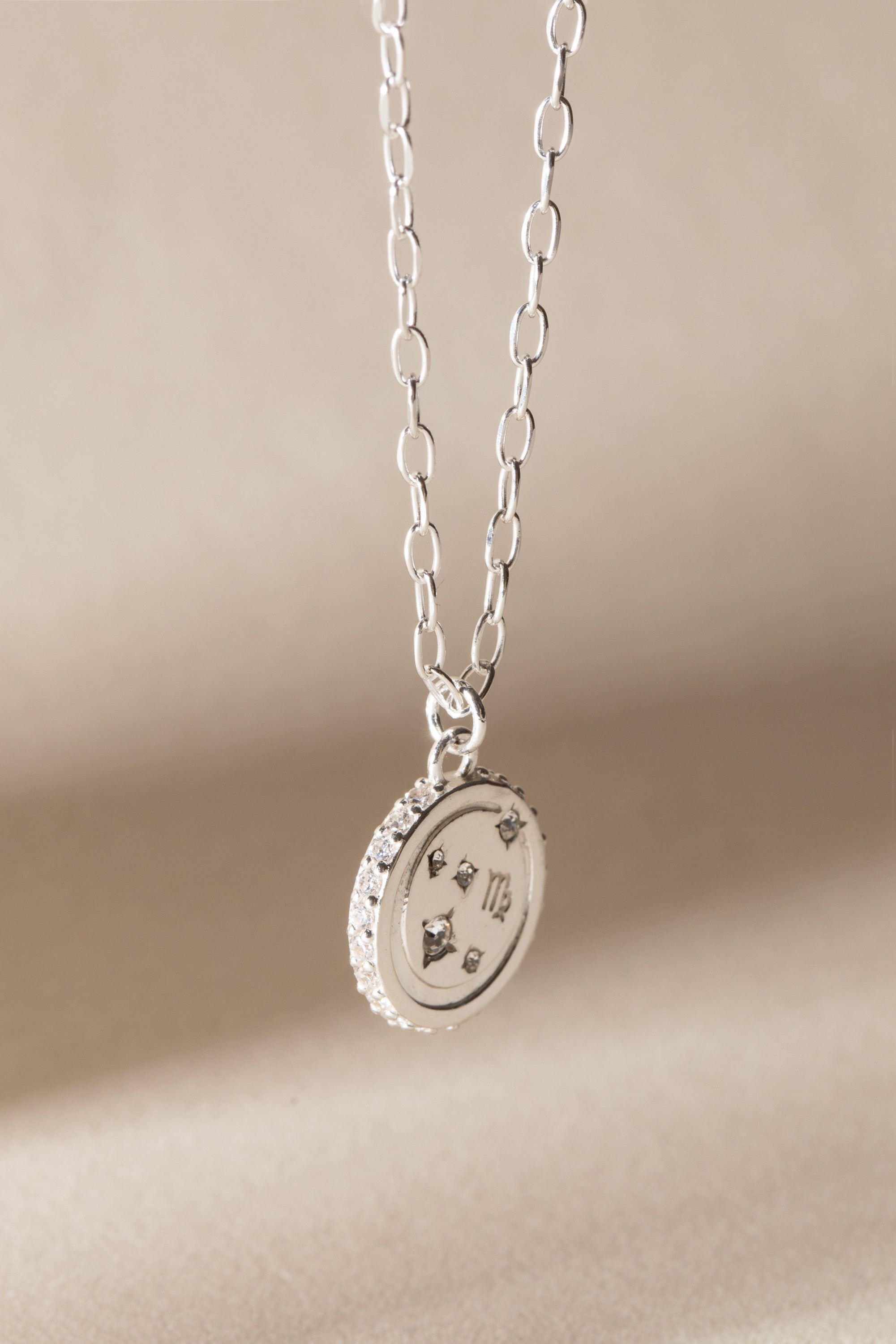 Sterling silver Virgo Zodiac necklace by ALEX AND ANI featuring a pendant with the Virgo symbol on a delicate chain.