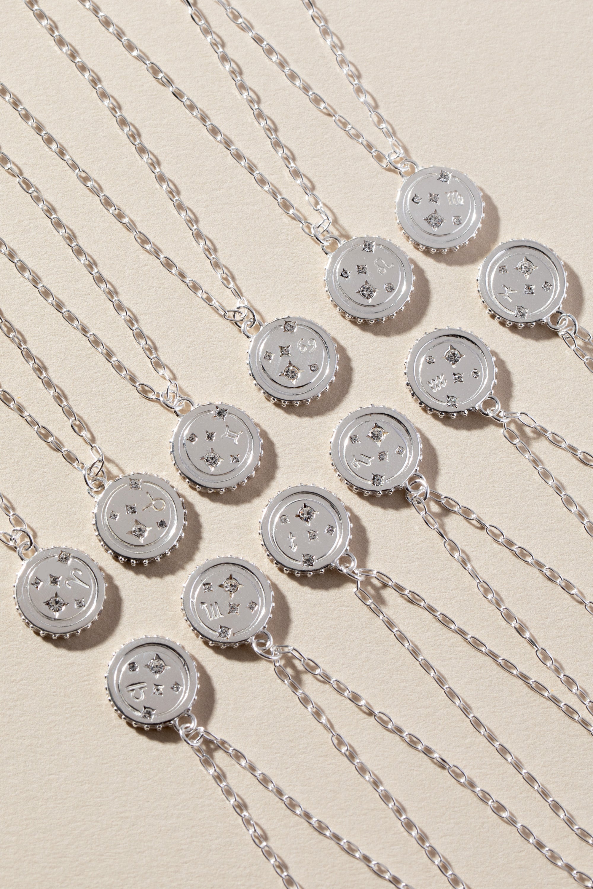 Sterling silver Virgo zodiac necklace by ALEX AND ANI featuring a pendant with Virgo symbol on a delicate chain.