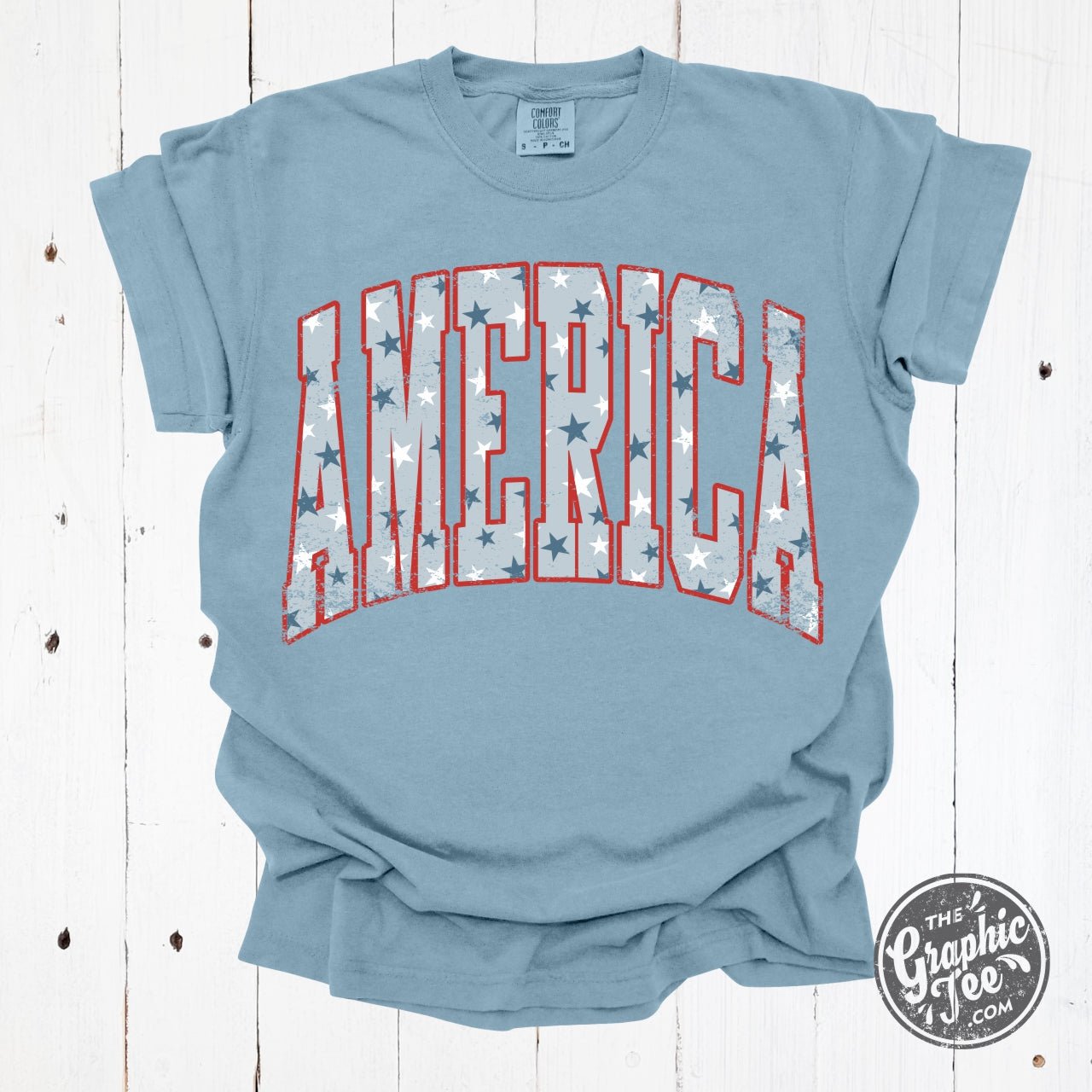 America Star Spangled Pigment Dyed Short Sleeve Graphic Tee featuring patriotic star design and vibrant colors by The Graphic Tee.