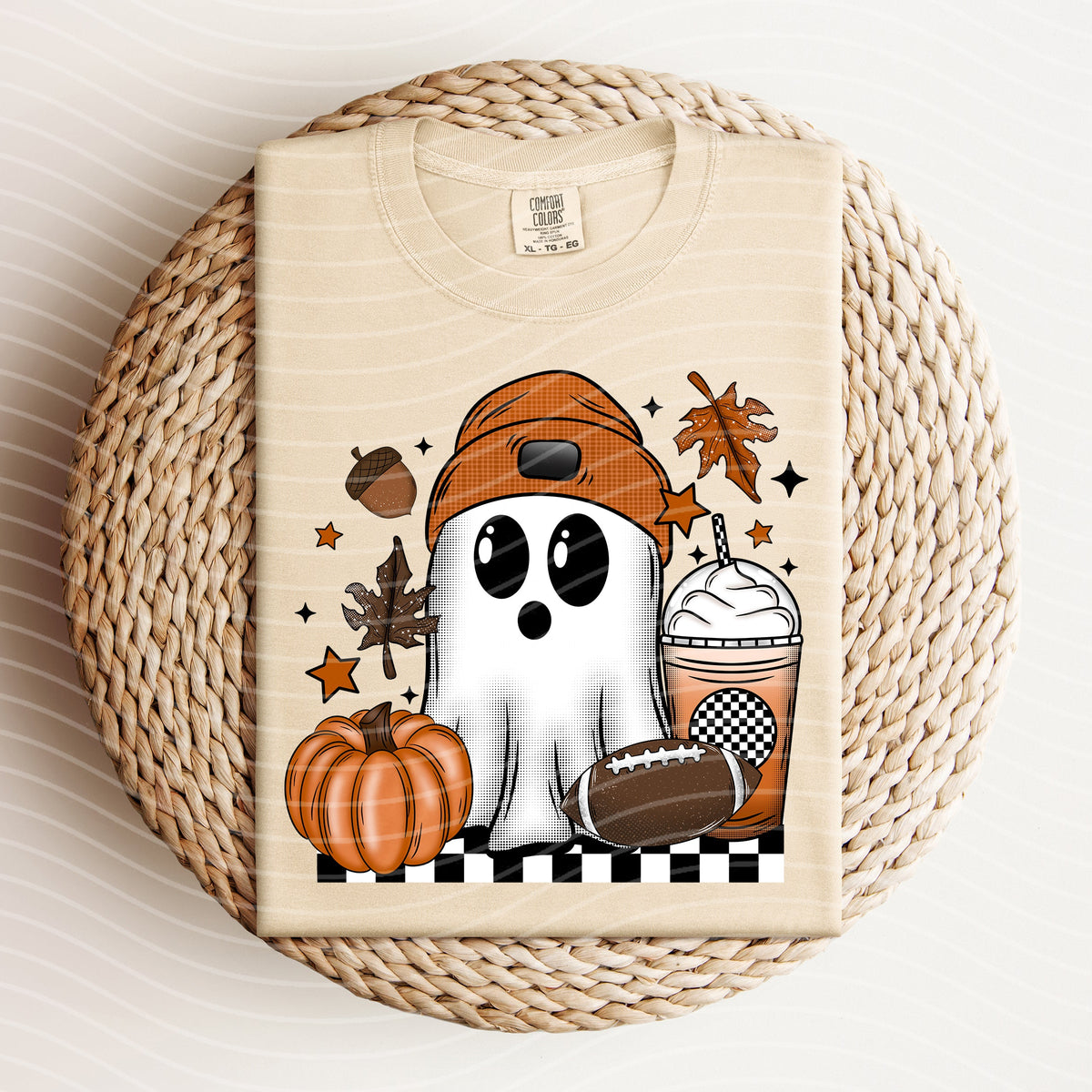 Football Ghost graphic tee by Anchored Grace Boutique featuring a spooky ghost design on a casual t-shirt.