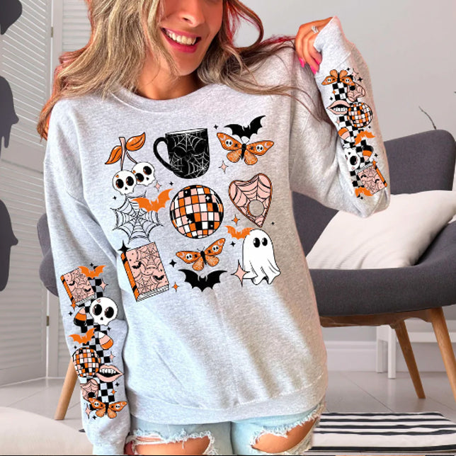 Halloween collage graphic tee by Anchored Grace Boutique featuring spooky and festive Halloween-themed illustrations on a casual t-shirt.