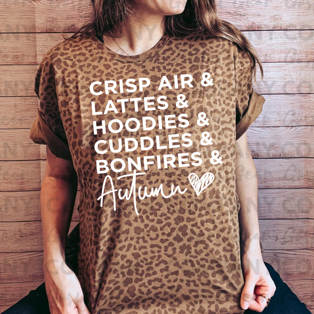 Autumn graphic tee by Anchored Grace Boutique featuring fall-themed design, casual short-sleeve shirt, and vibrant autumn colors.