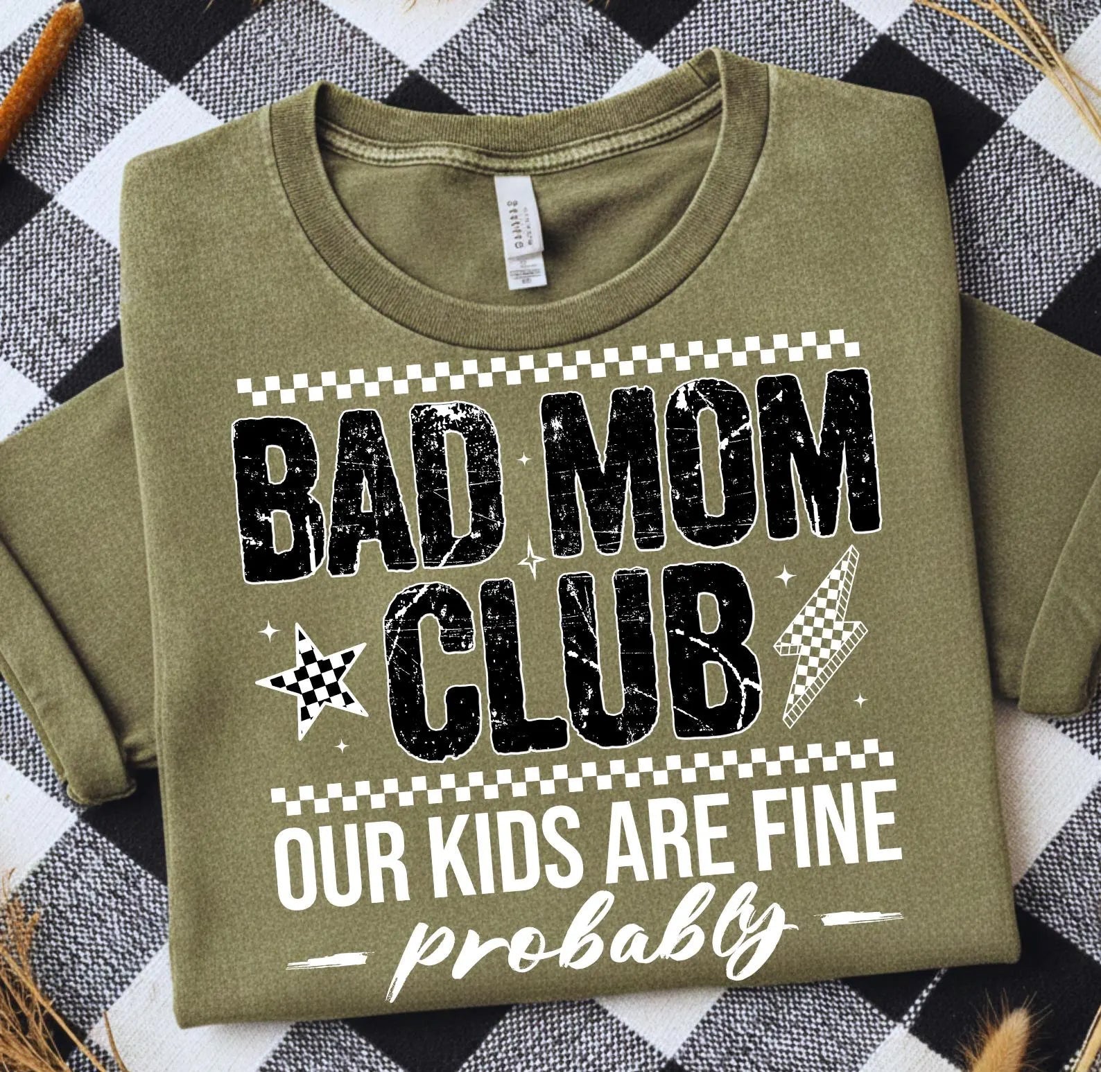 Bad Mom Club graphic tee by Anchored Grace Boutique, showing a casual black cotton t-shirt with bold white and red graphic print.