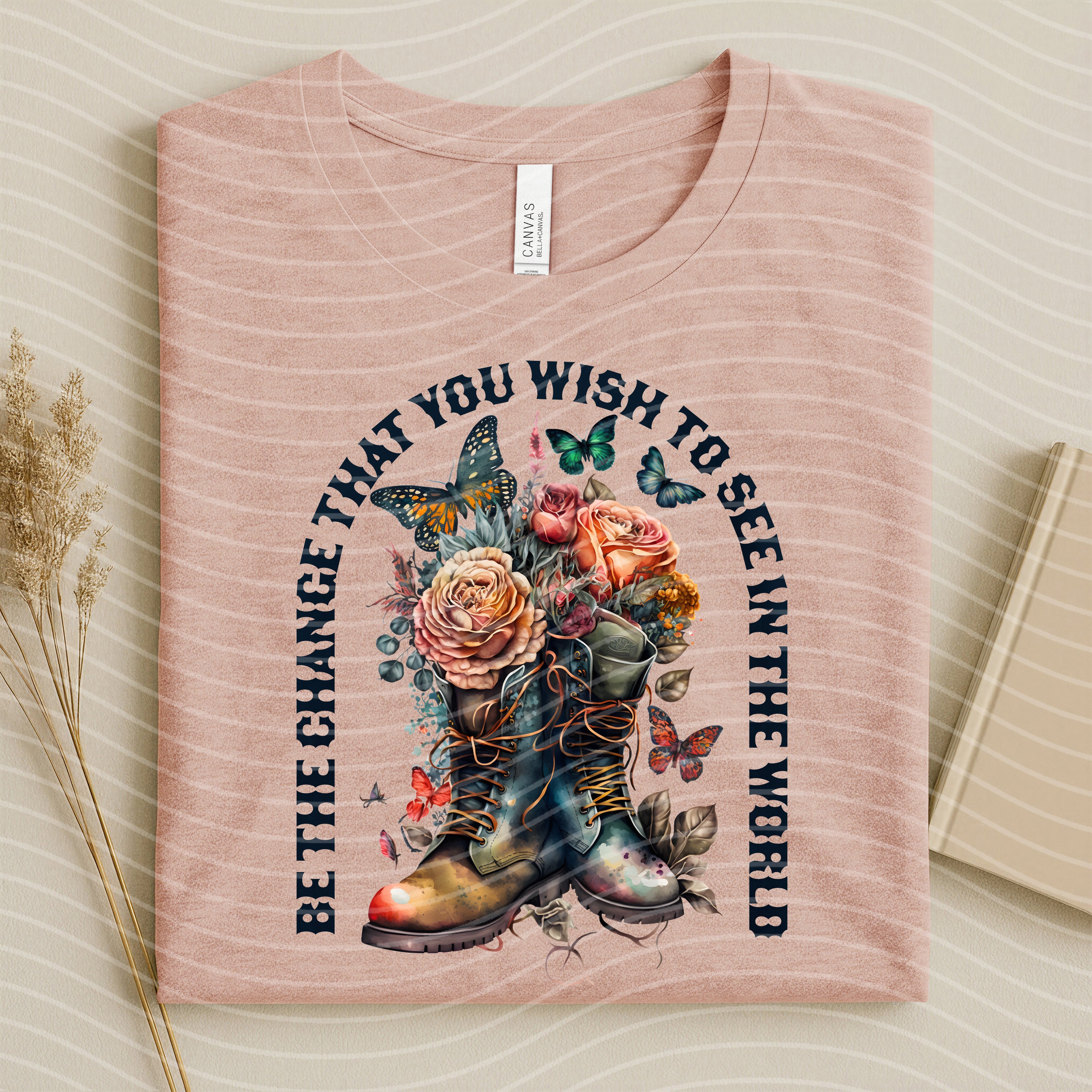 Be the Change graphic tee by Anchored Grace Boutique featuring a stylish design and comfortable fit, casual wear for everyday style.